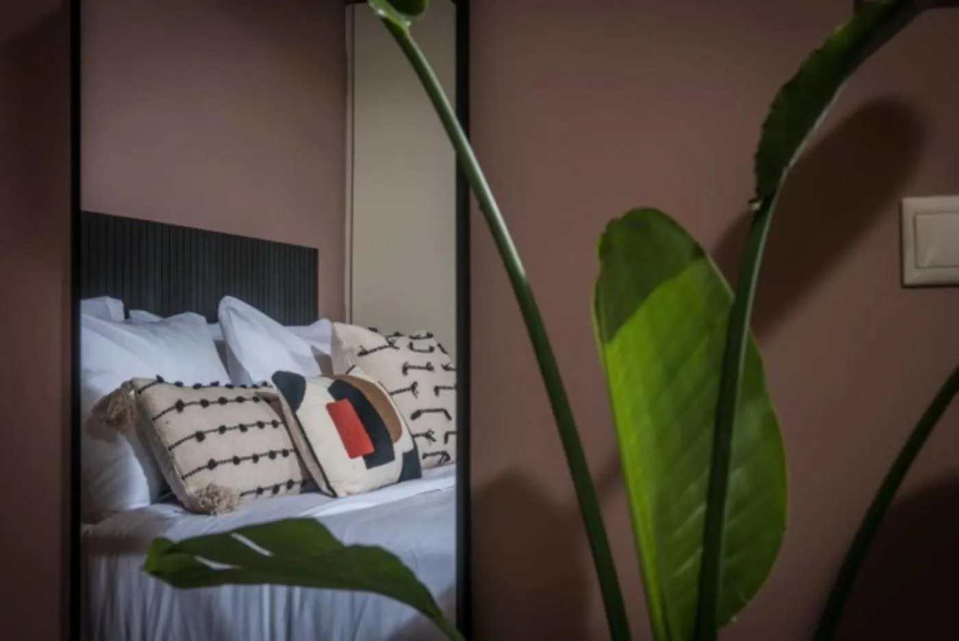 Bed in Centro Vero Suites by Omilos Hotels