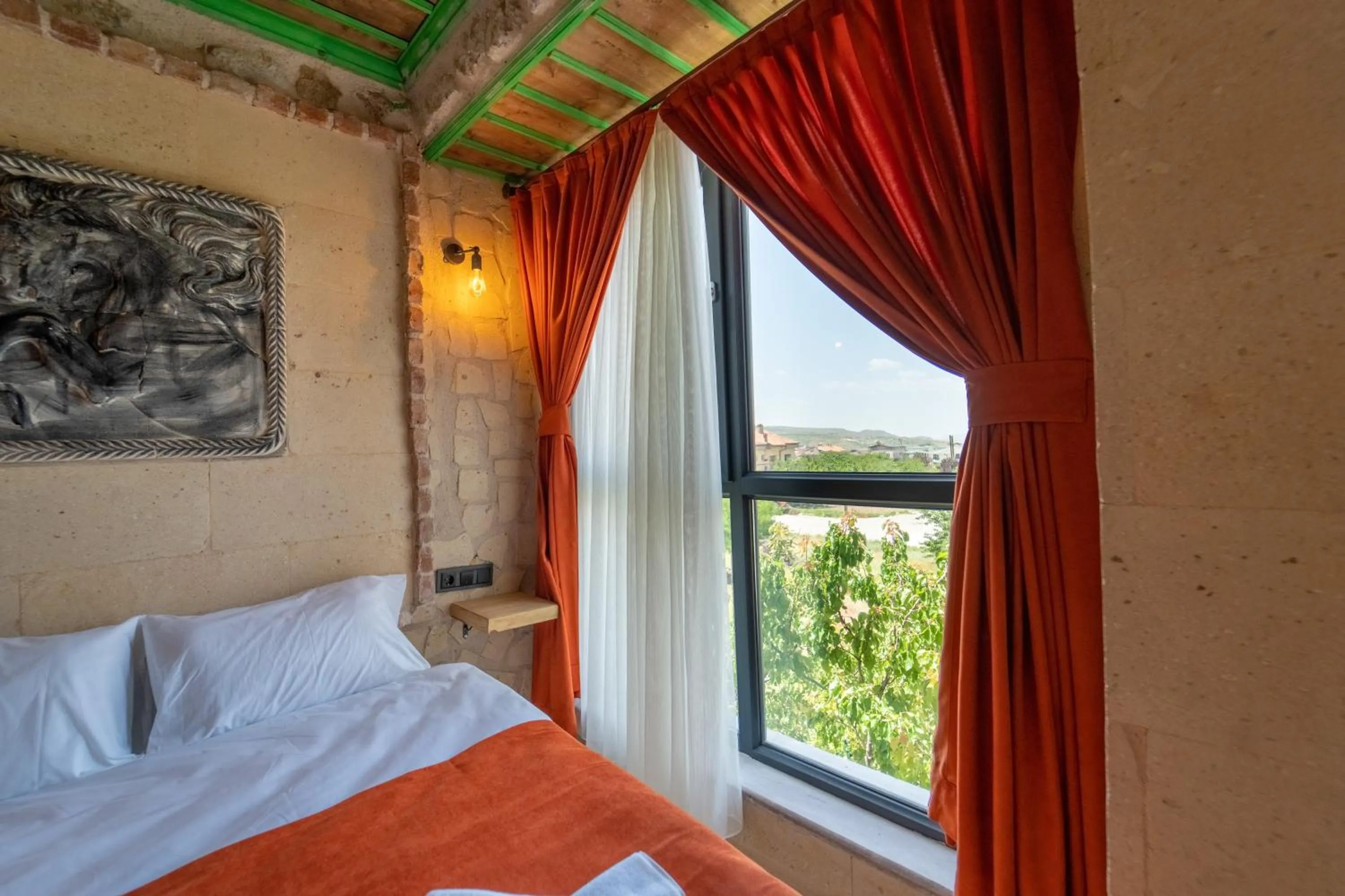 Garden view, Bed in Muse Cappadocia