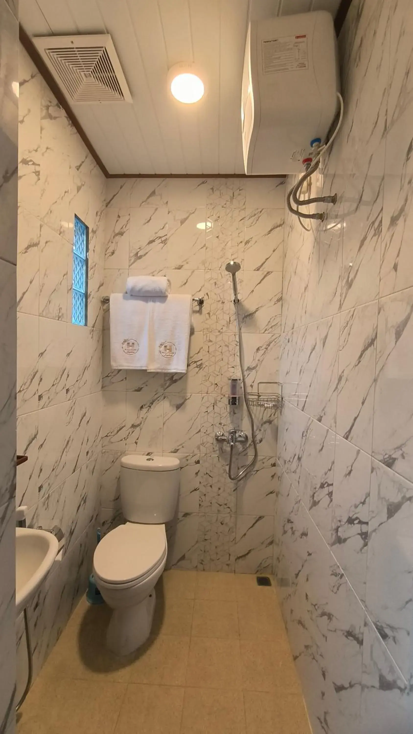 Deluxe Family Room in Harmony Magelang Syariah Deluxe Family Room in Harmony Magelang Syariah