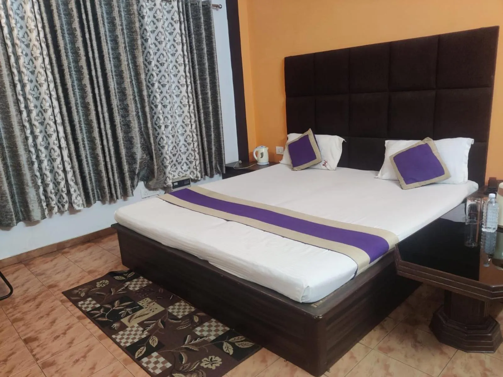 Bed in Mansarover Hotel & Banquets