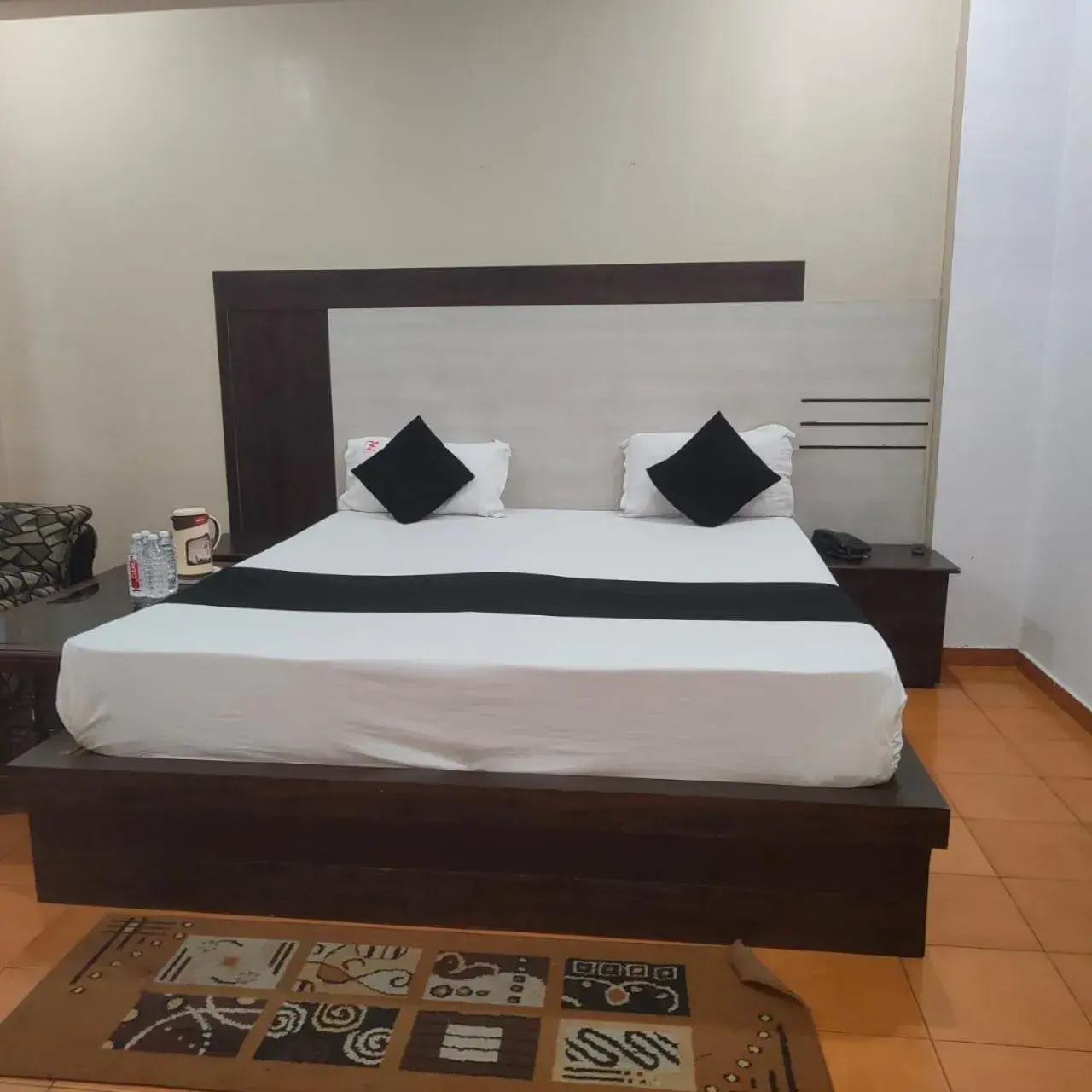 Bed in Mansarover Hotel & Banquets Bed in Mansarover Hotel & Banquets