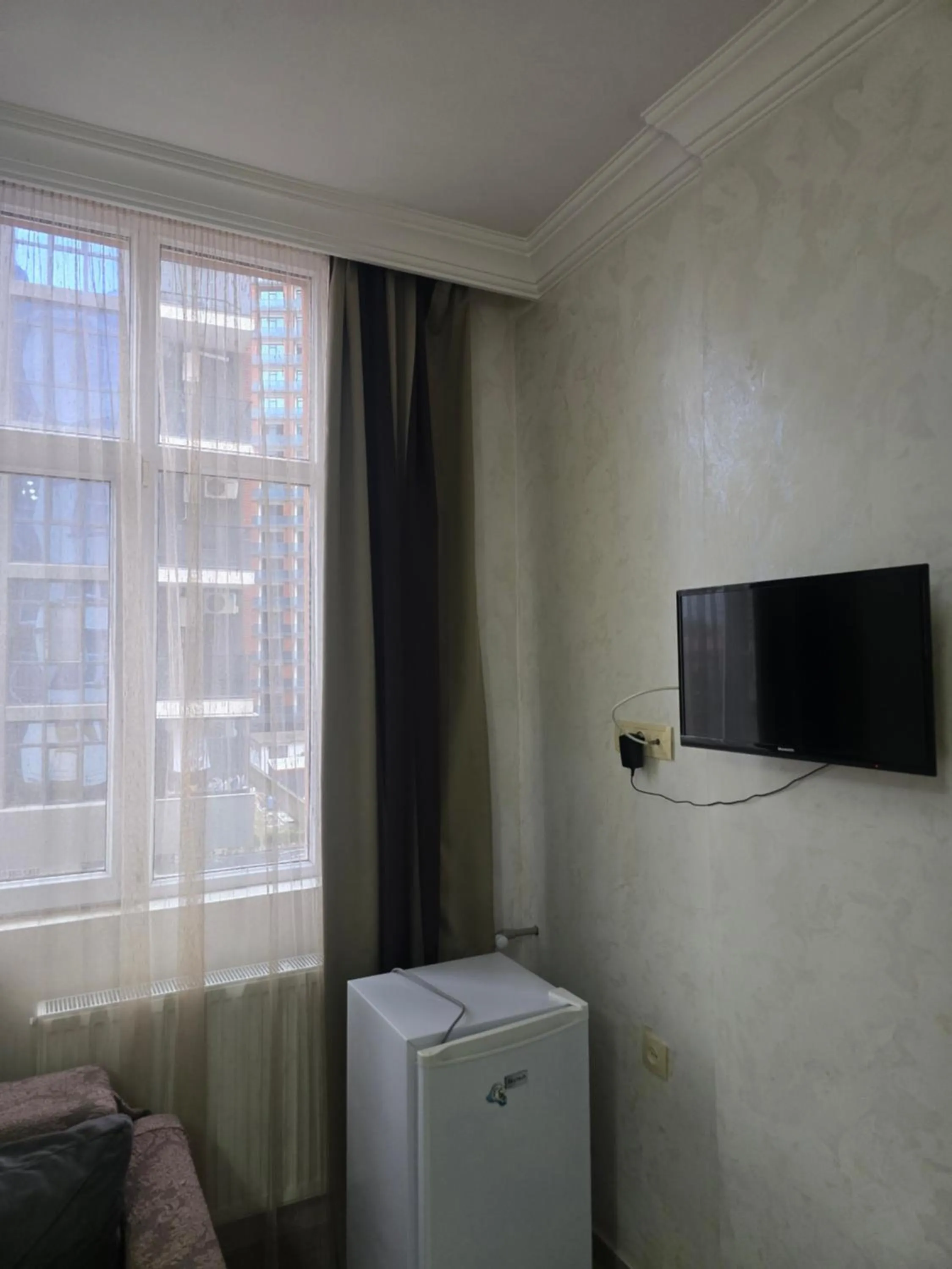 Communal lounge/ TV room in Batumi Inn Hotel