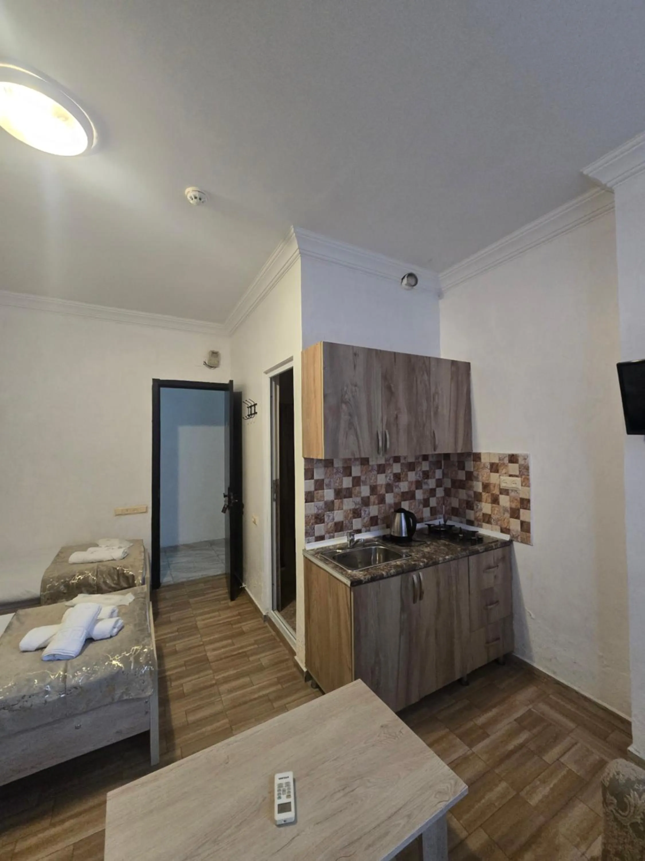 Living room, Bed in Batumi Inn Hotel