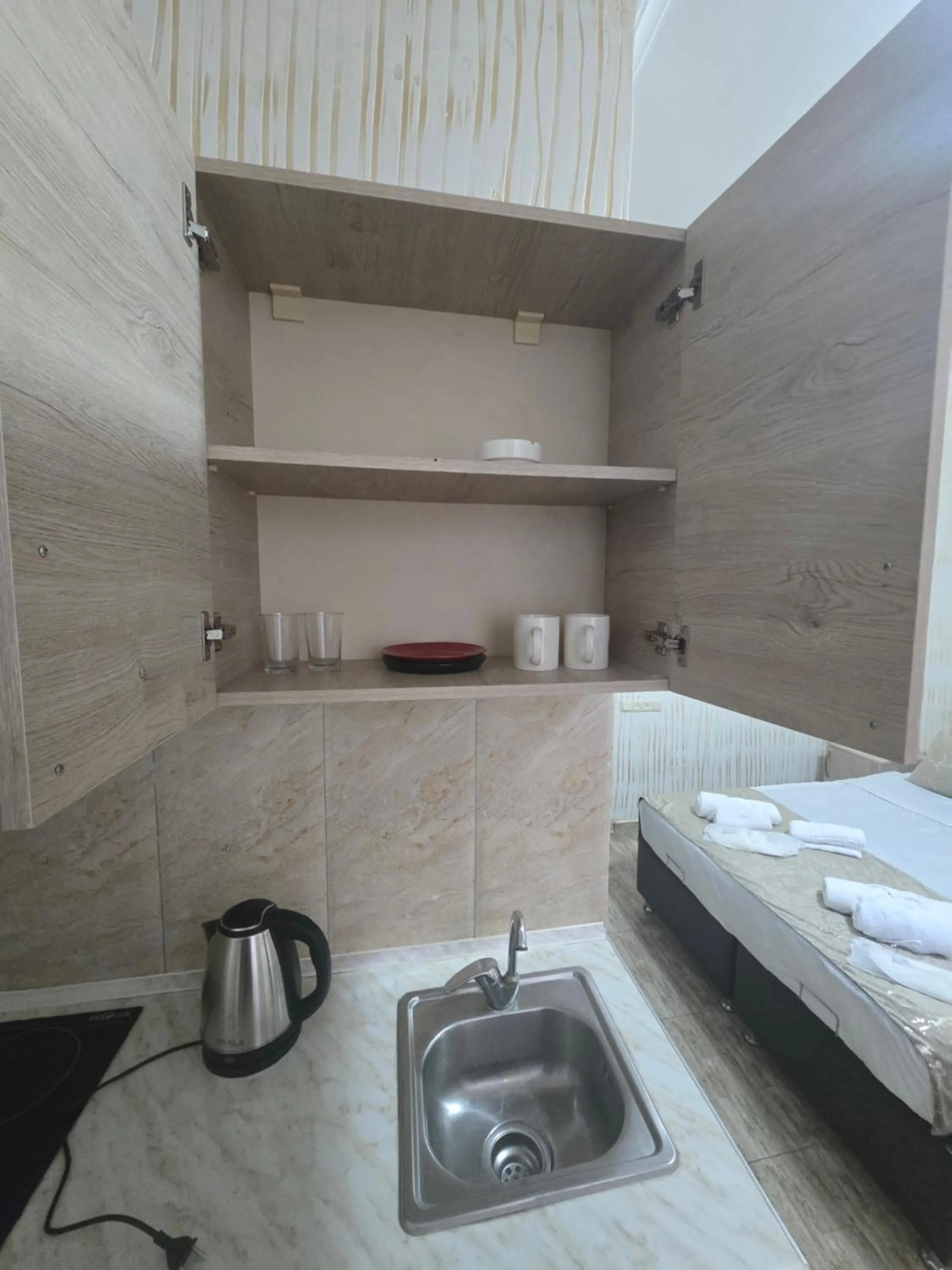 Coffee/tea facilities, Bed in Batumi Inn Hotel