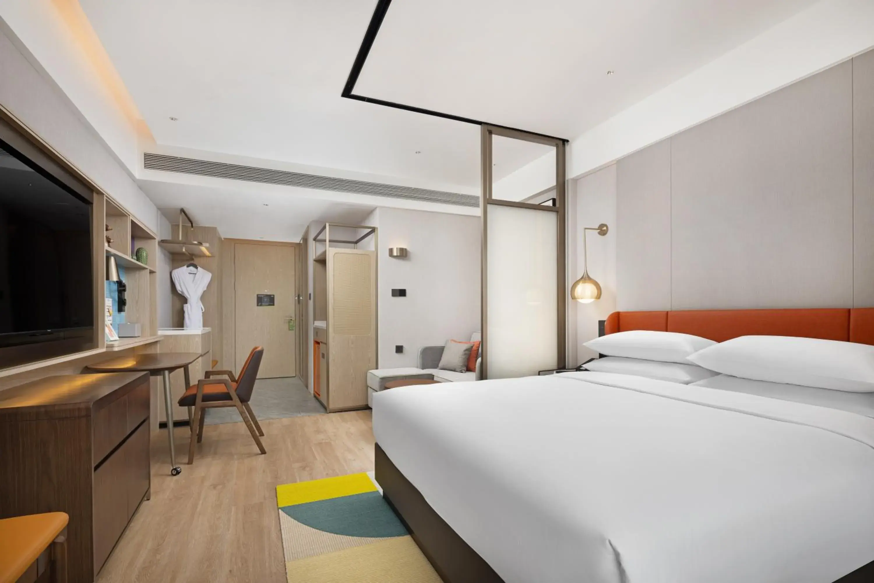 Bedroom in Home2 Suite by Hilton Guiyang Nanming Jiaxiu Bedroom in Home2 Suite by Hilton Guiyang Nanming Jiaxiu