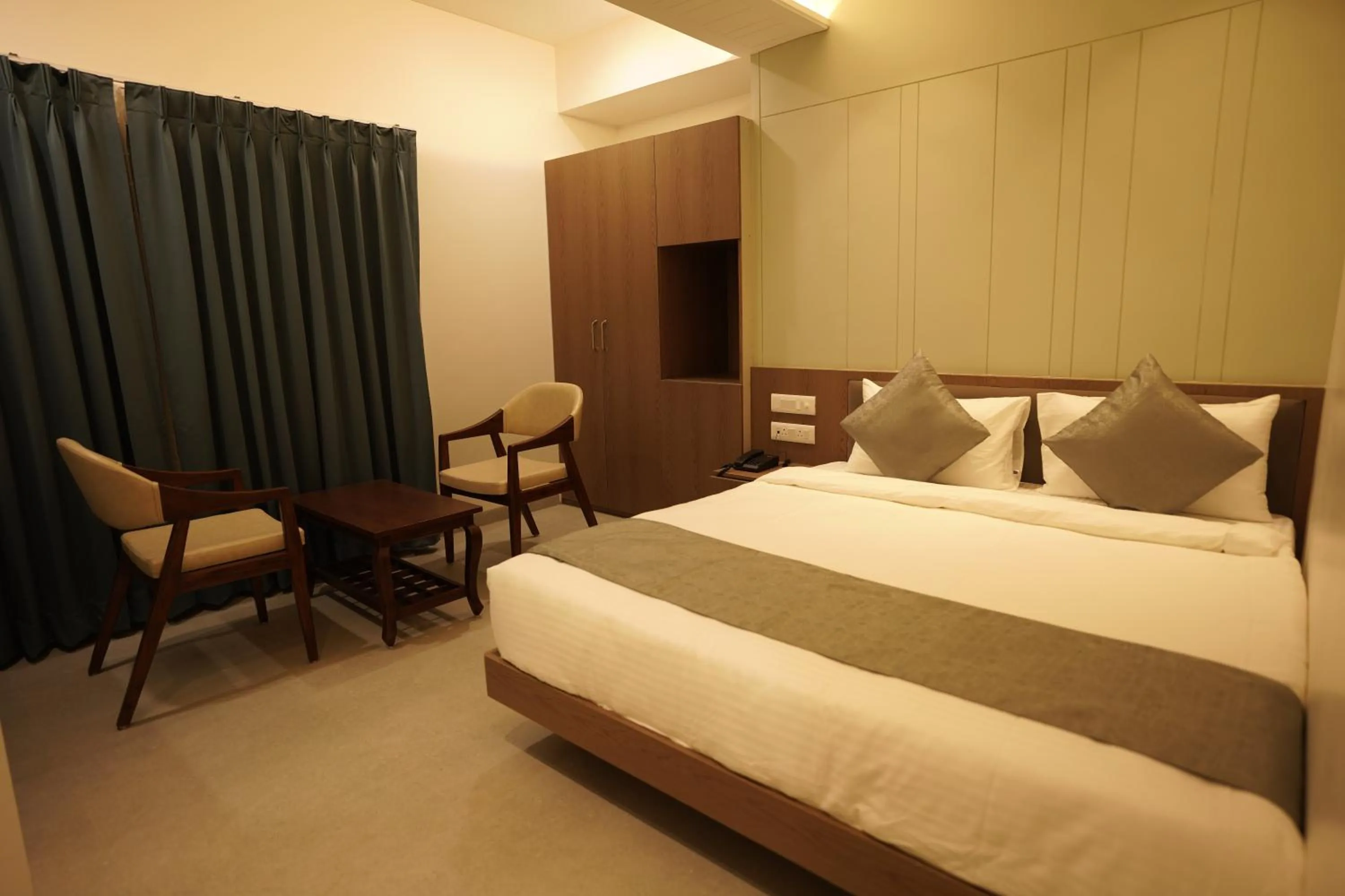 Bed in A Square Executive Hotel