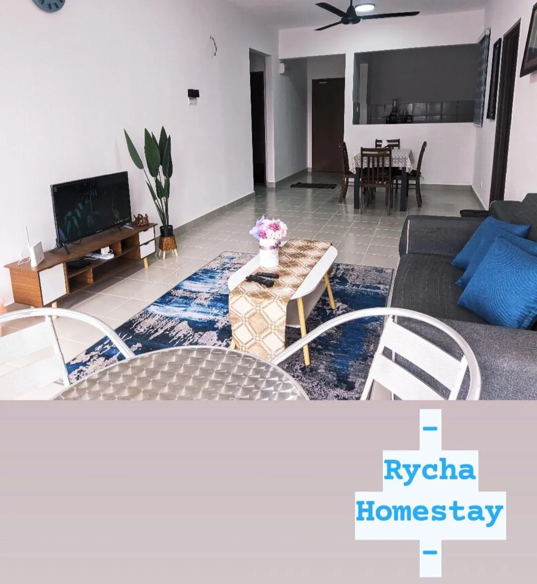 Communal lounge/ TV room in Rycha Homestay A famosa near Waterpark