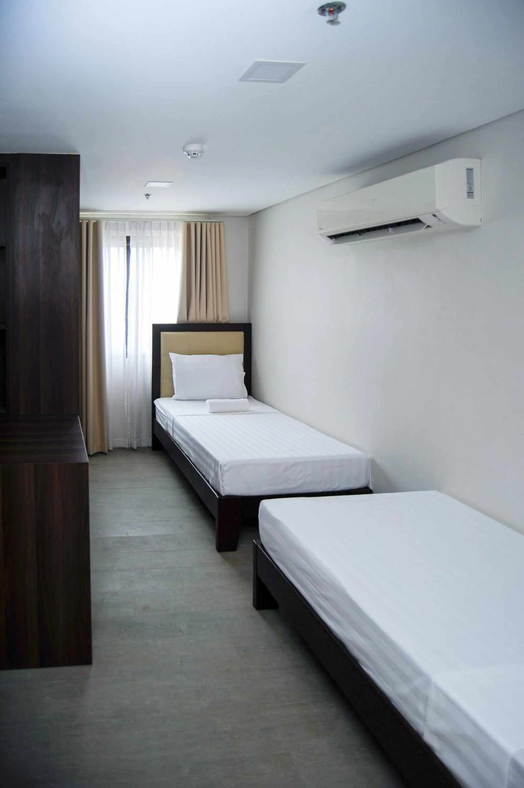 Bed in Kaia Isabelle Hotel Puerto Princesa