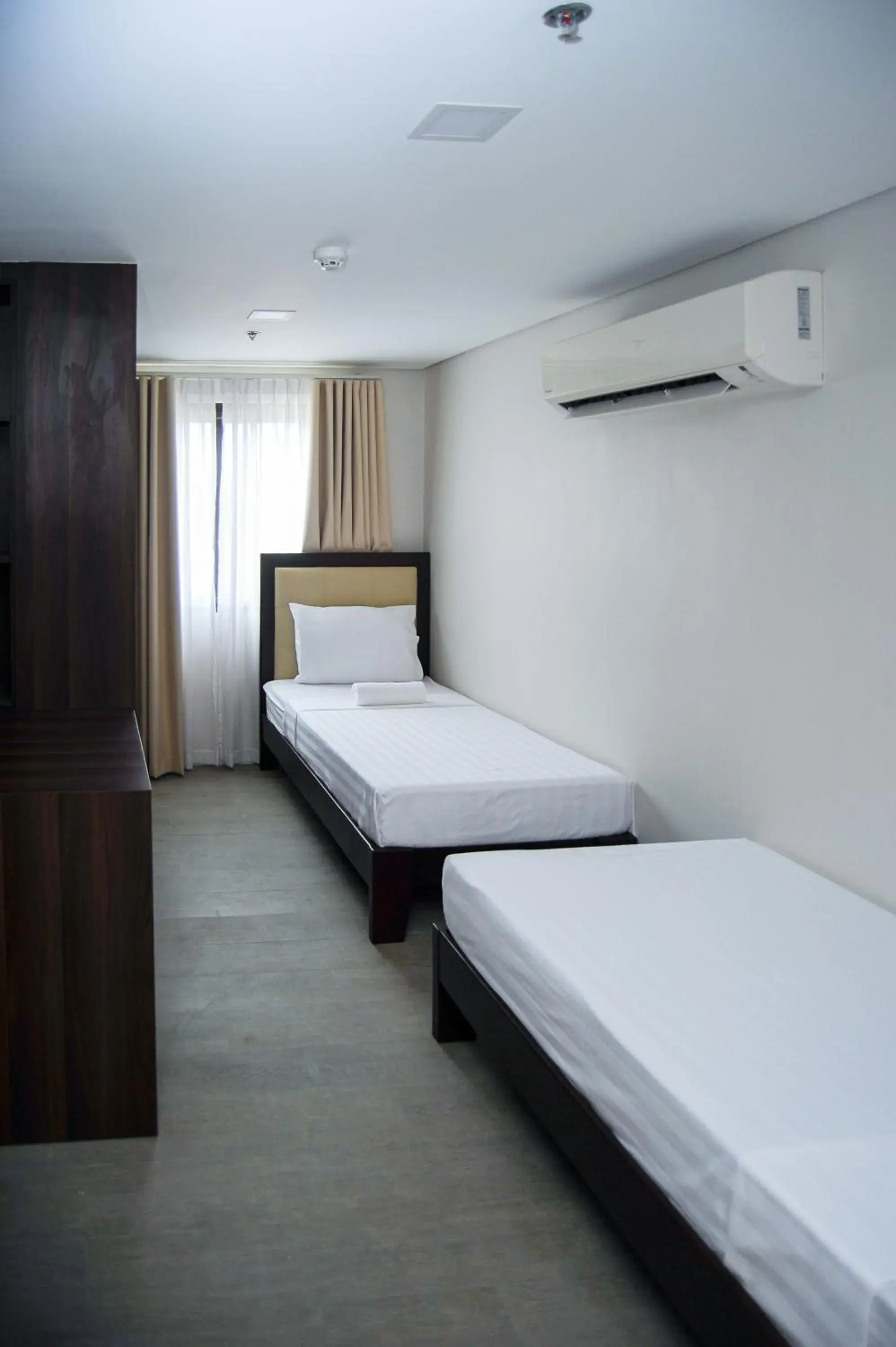 Bed in Kaia Isabelle Hotel Puerto Princesa Bed in Kaia Isabelle Hotel Puerto Princesa