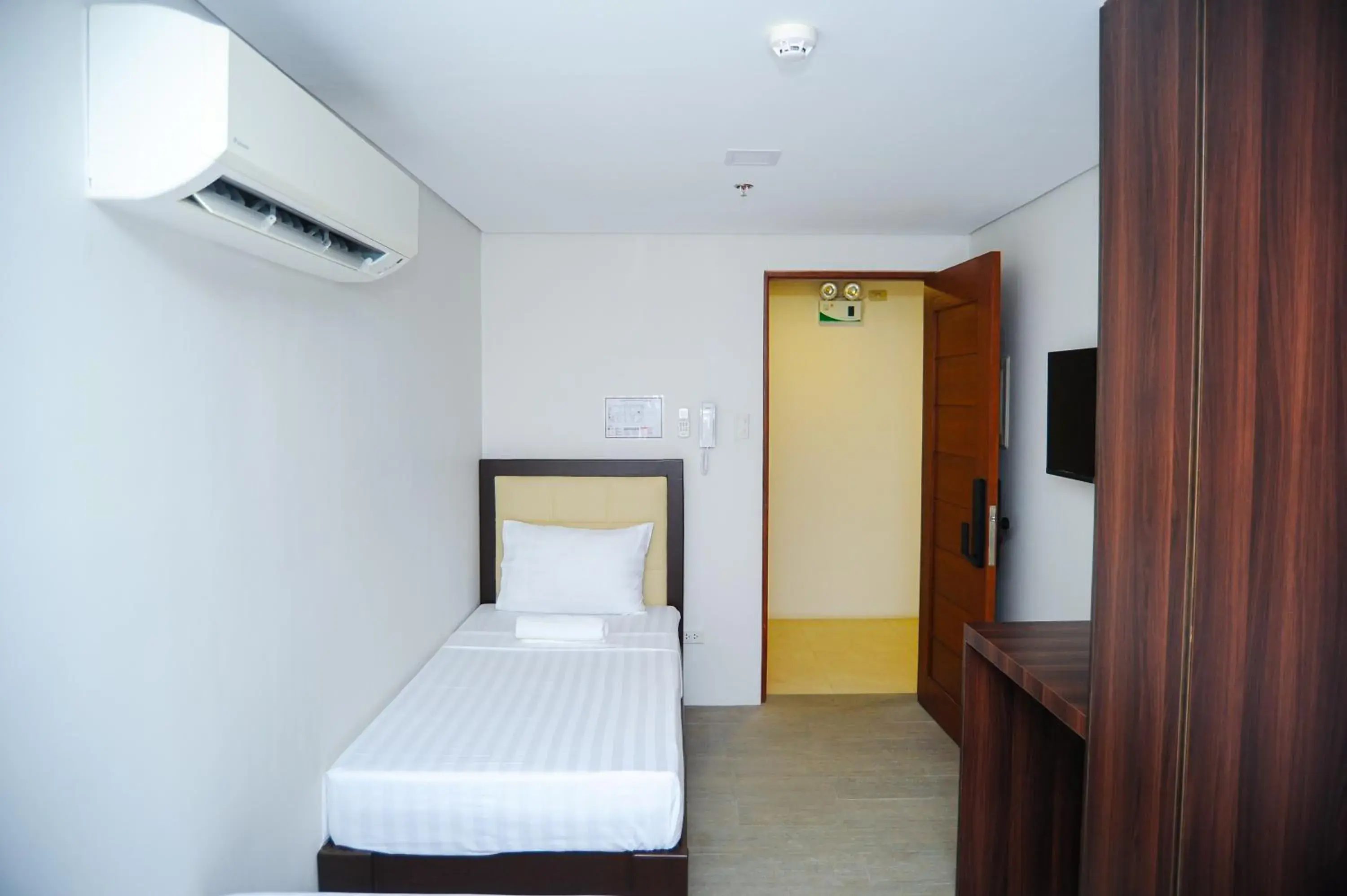 Bed in Kaia Isabelle Hotel Puerto Princesa Bed in Kaia Isabelle Hotel Puerto Princesa