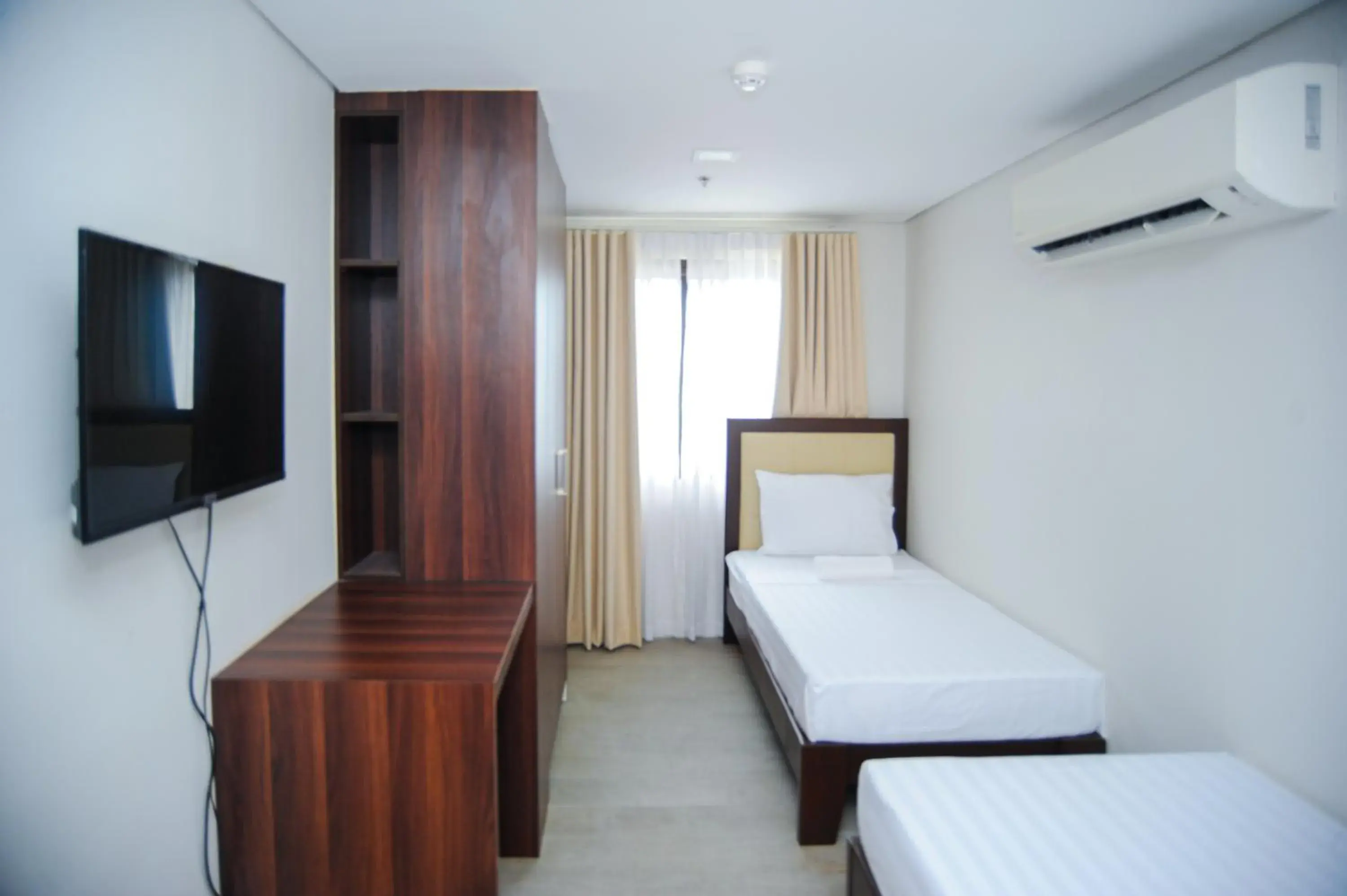 Bed in Kaia Isabelle Hotel Puerto Princesa Bed in Kaia Isabelle Hotel Puerto Princesa