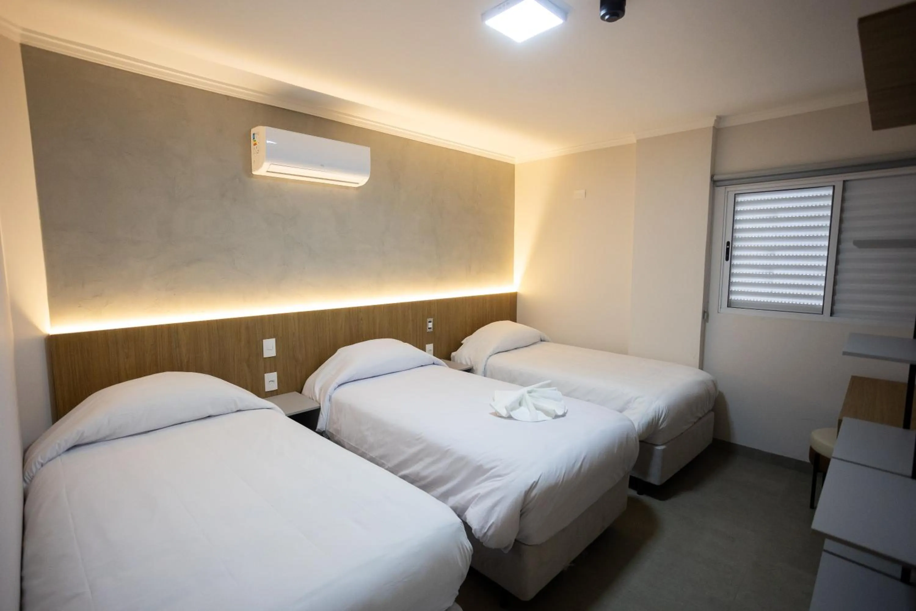 Bed in Terraço Flat Hotel