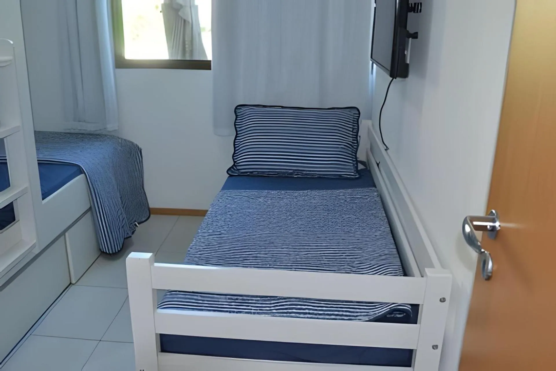 Bed in Nui Supreme Beach Living