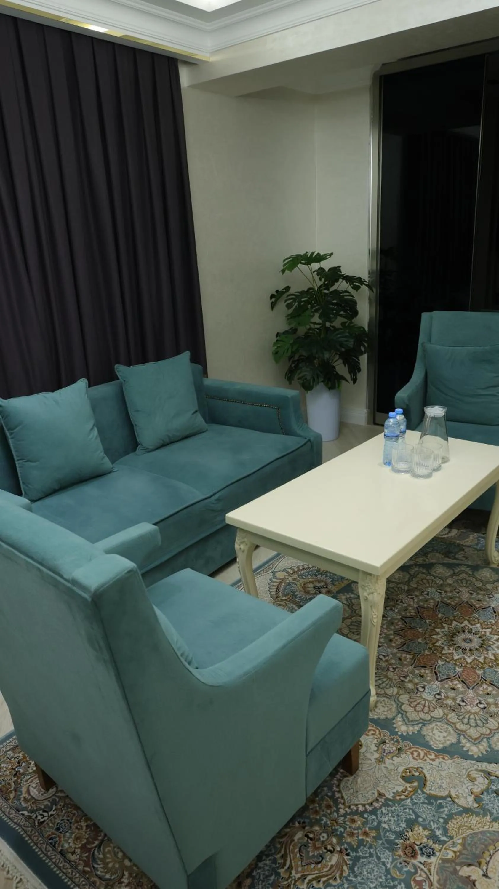 Living room in Zarafshan Grand Hotel city