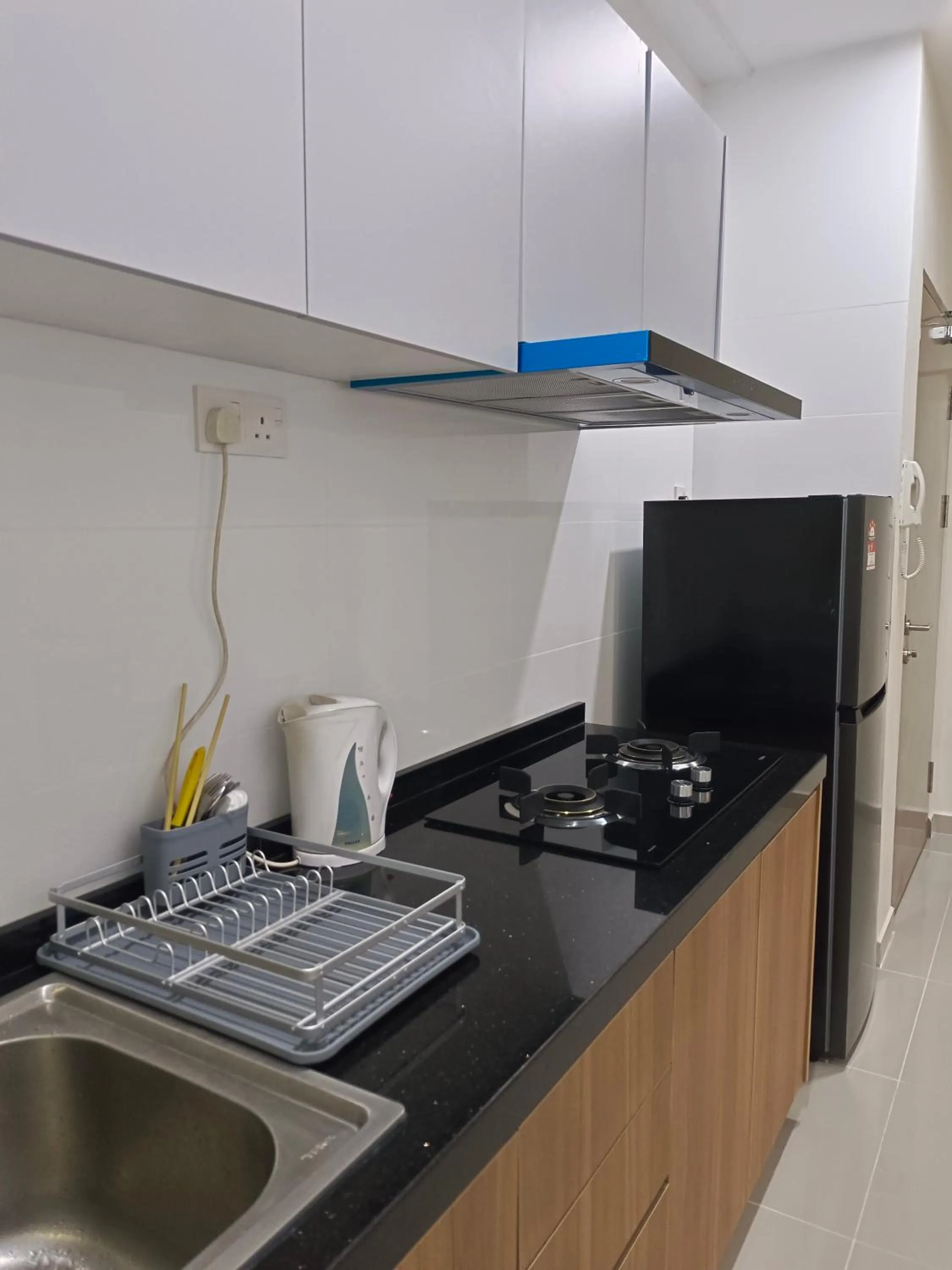 Kitchen or kitchenette in Sri Indah Pool Condostay