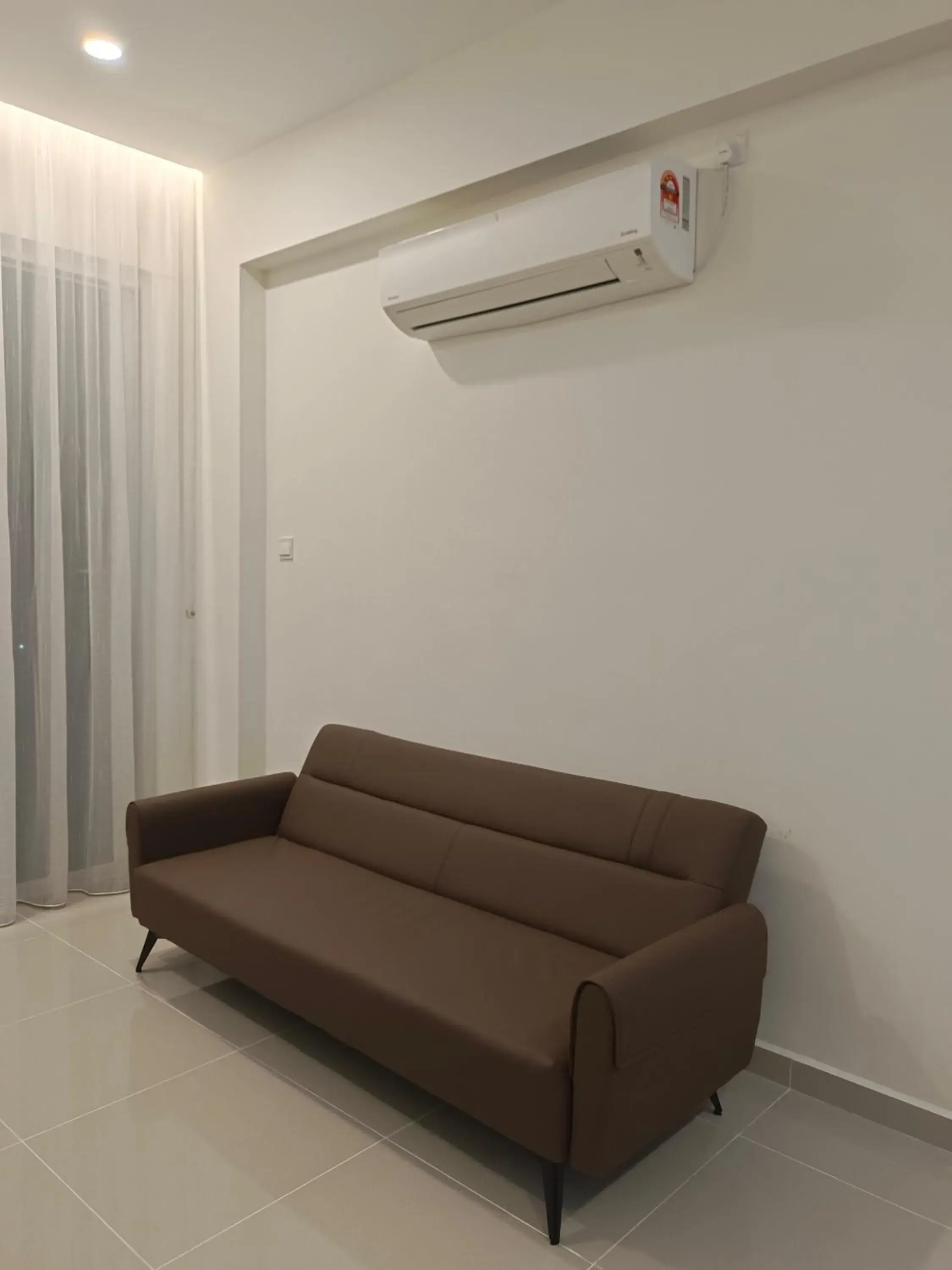 Living room in Sri Indah Pool Condostay Living room in Sri Indah Pool Condostay