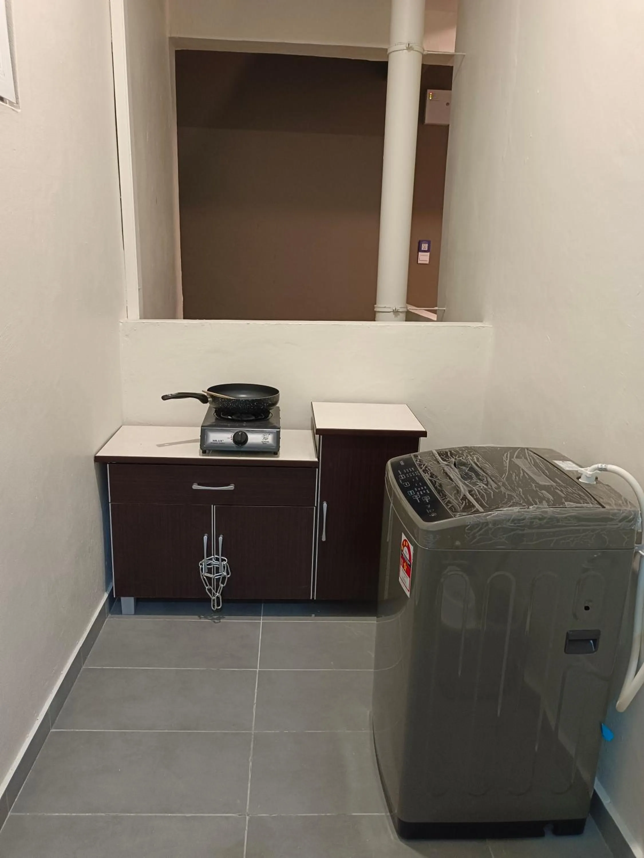 kitchen in Sri Indah Pool Condostay