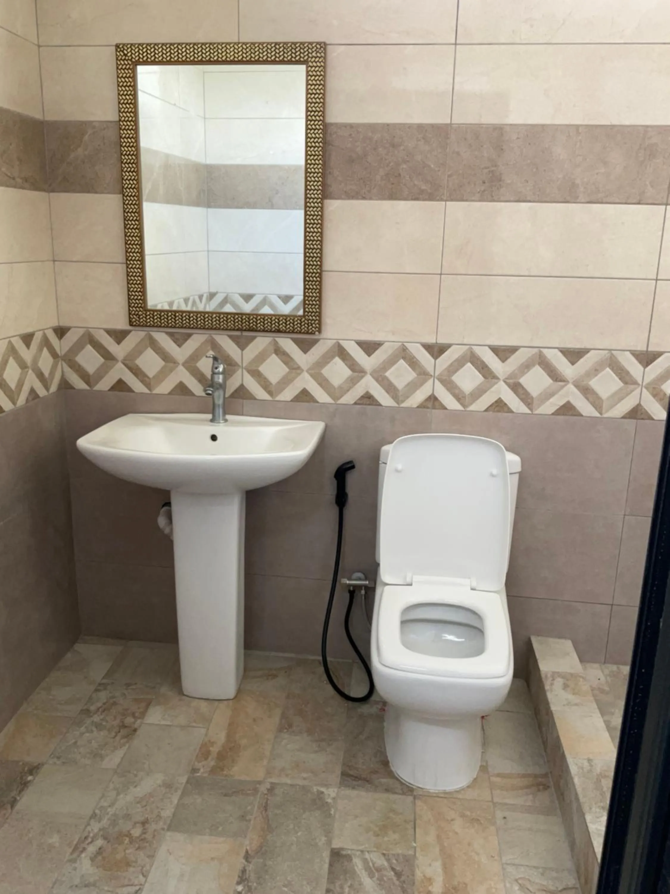 Toilet in Mahe Holiday Resort