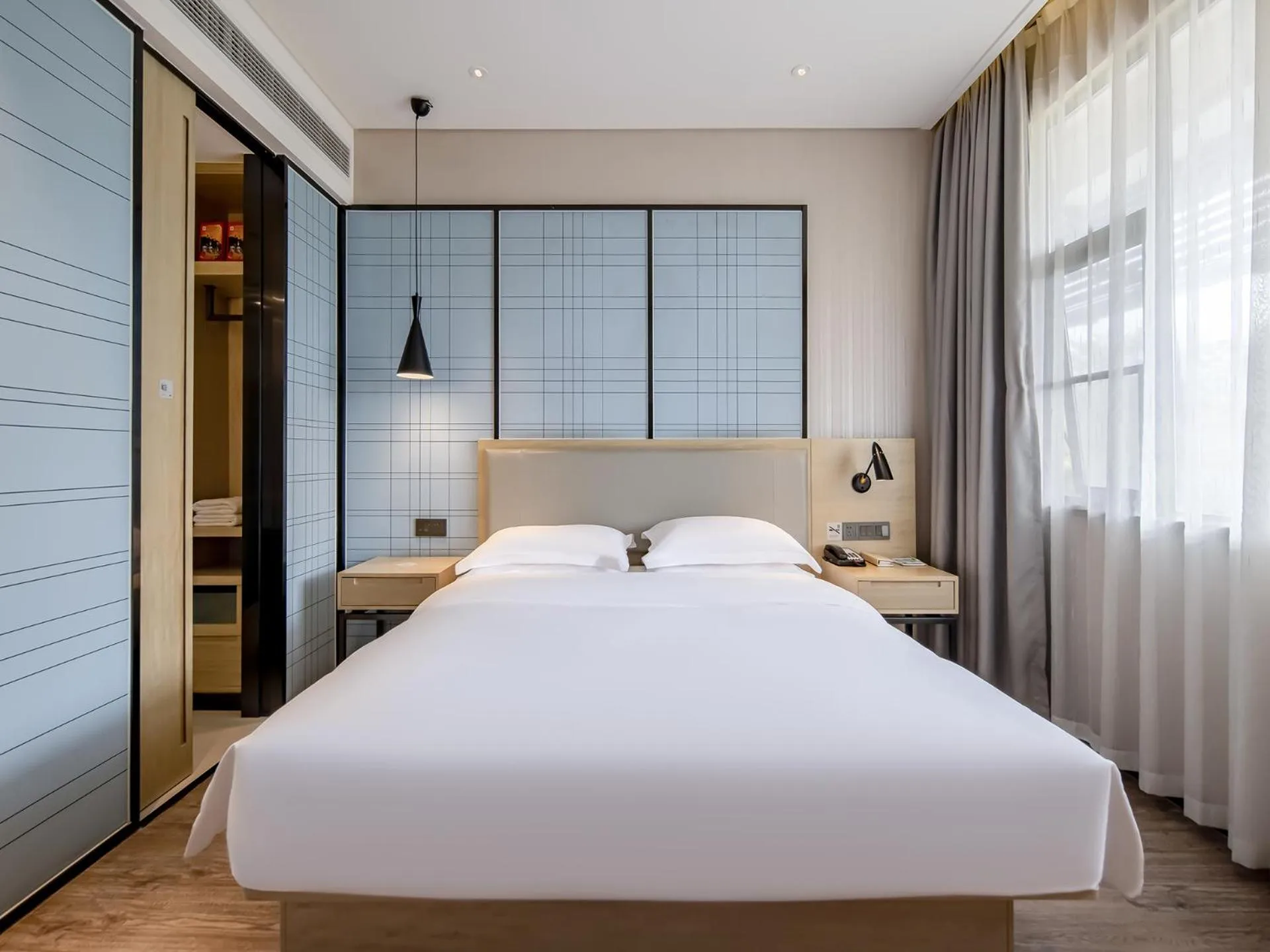 Bed in Echarm Hotel Nanning the MixC Exhibition Center Metro Station