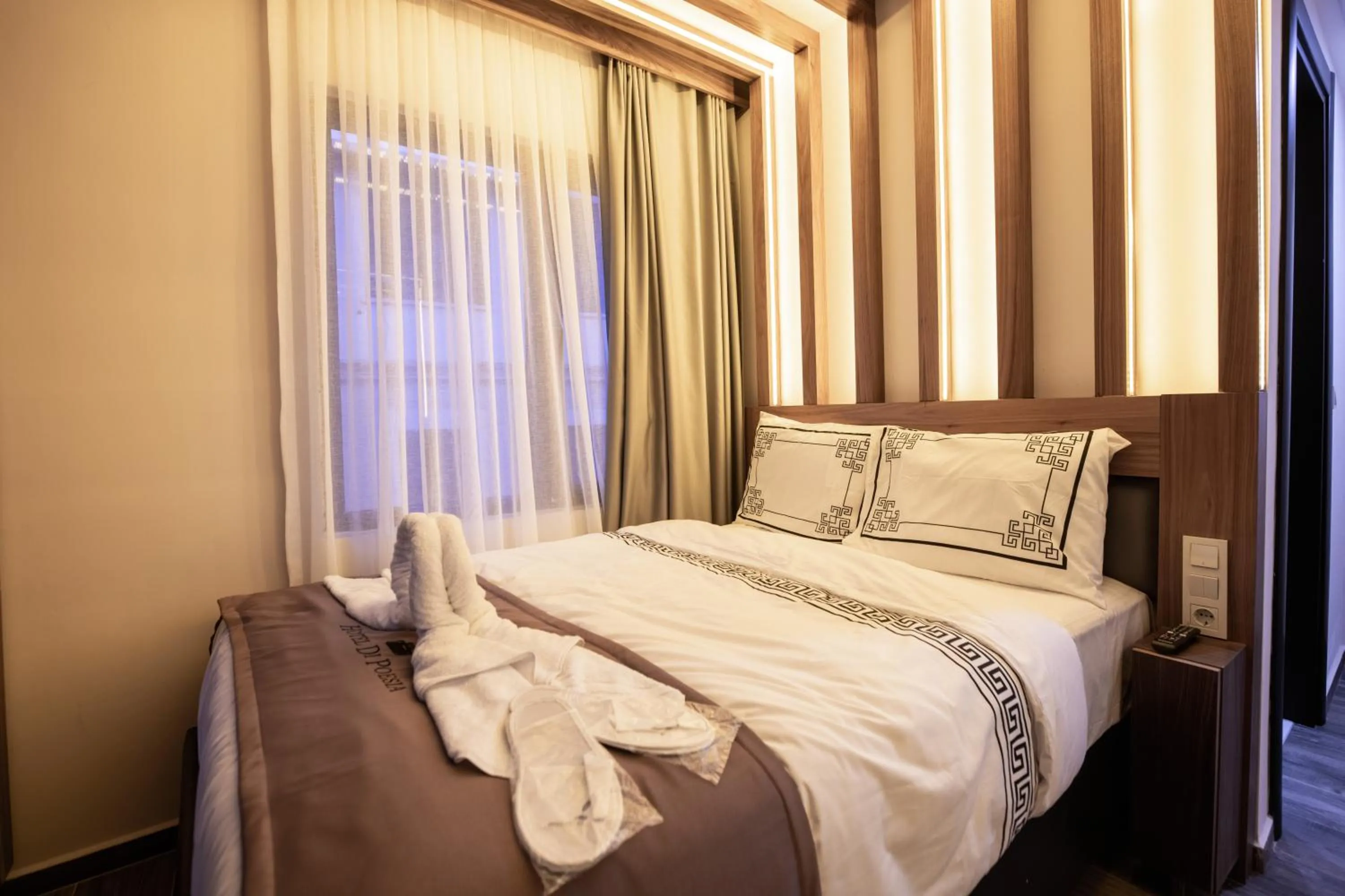 Bed in hotel di poesia deluxe