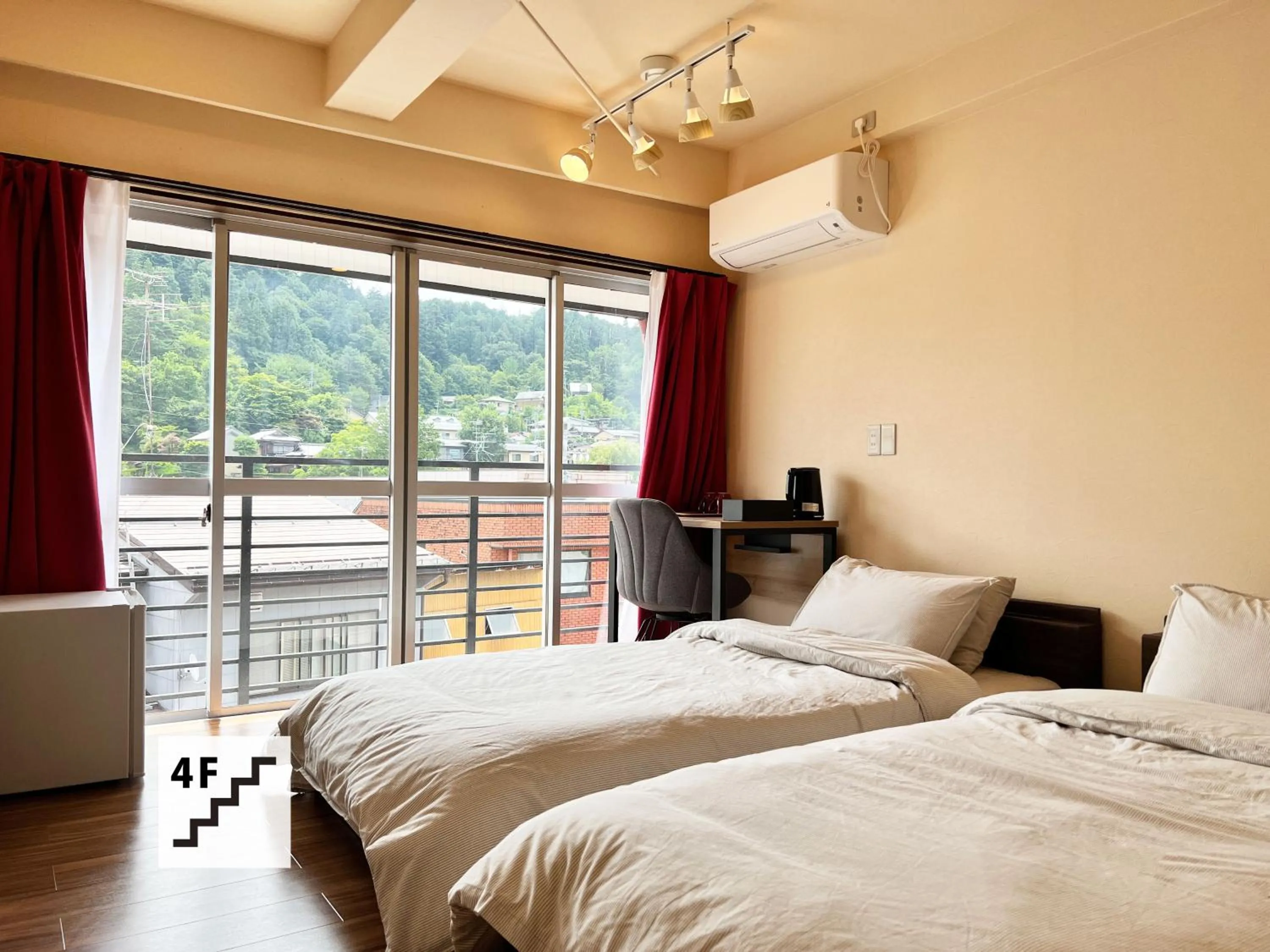 Bed in Jinya Sunset Inn by Murasaki