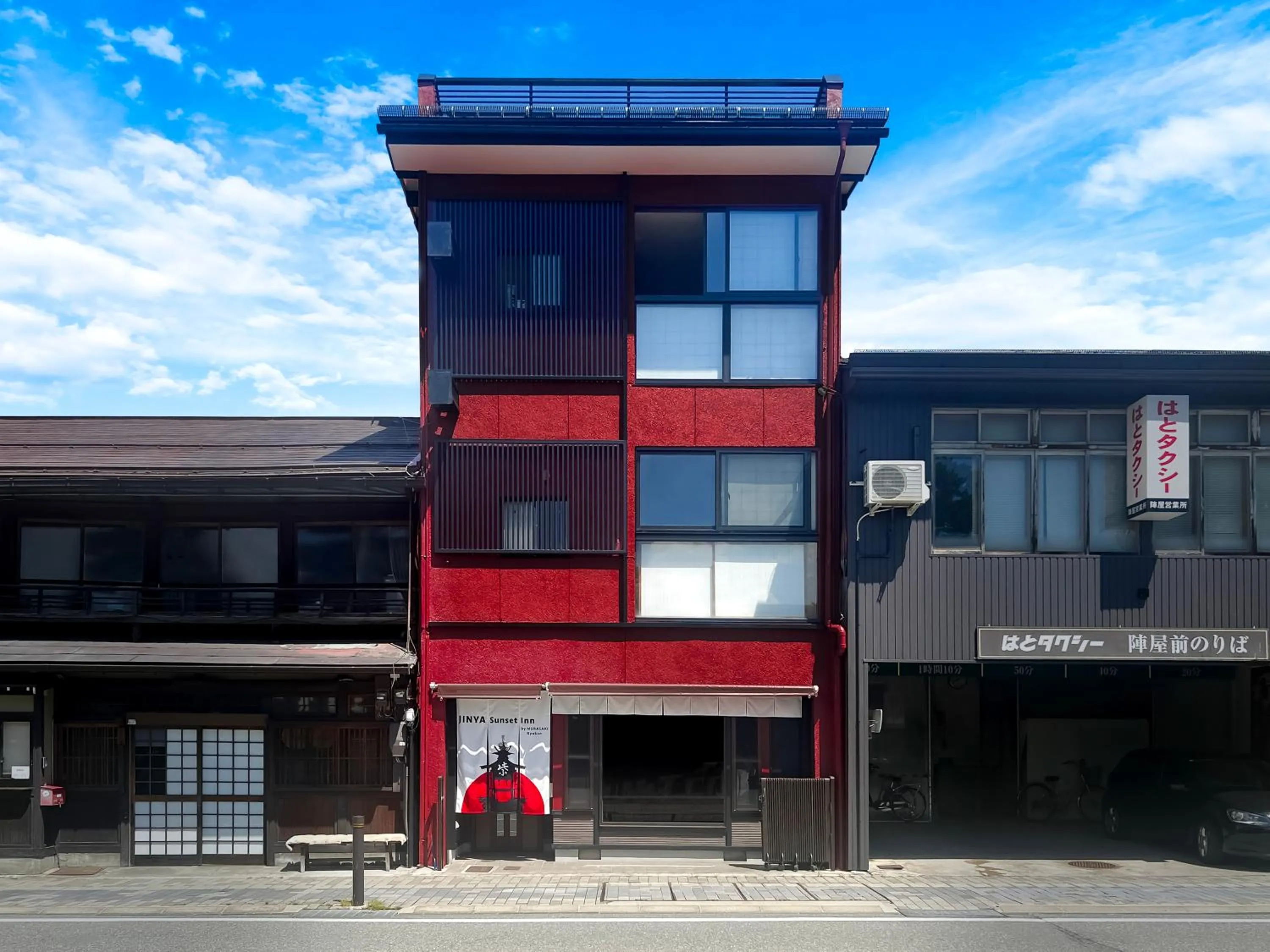 Property building in Jinya Sunset Inn by Murasaki