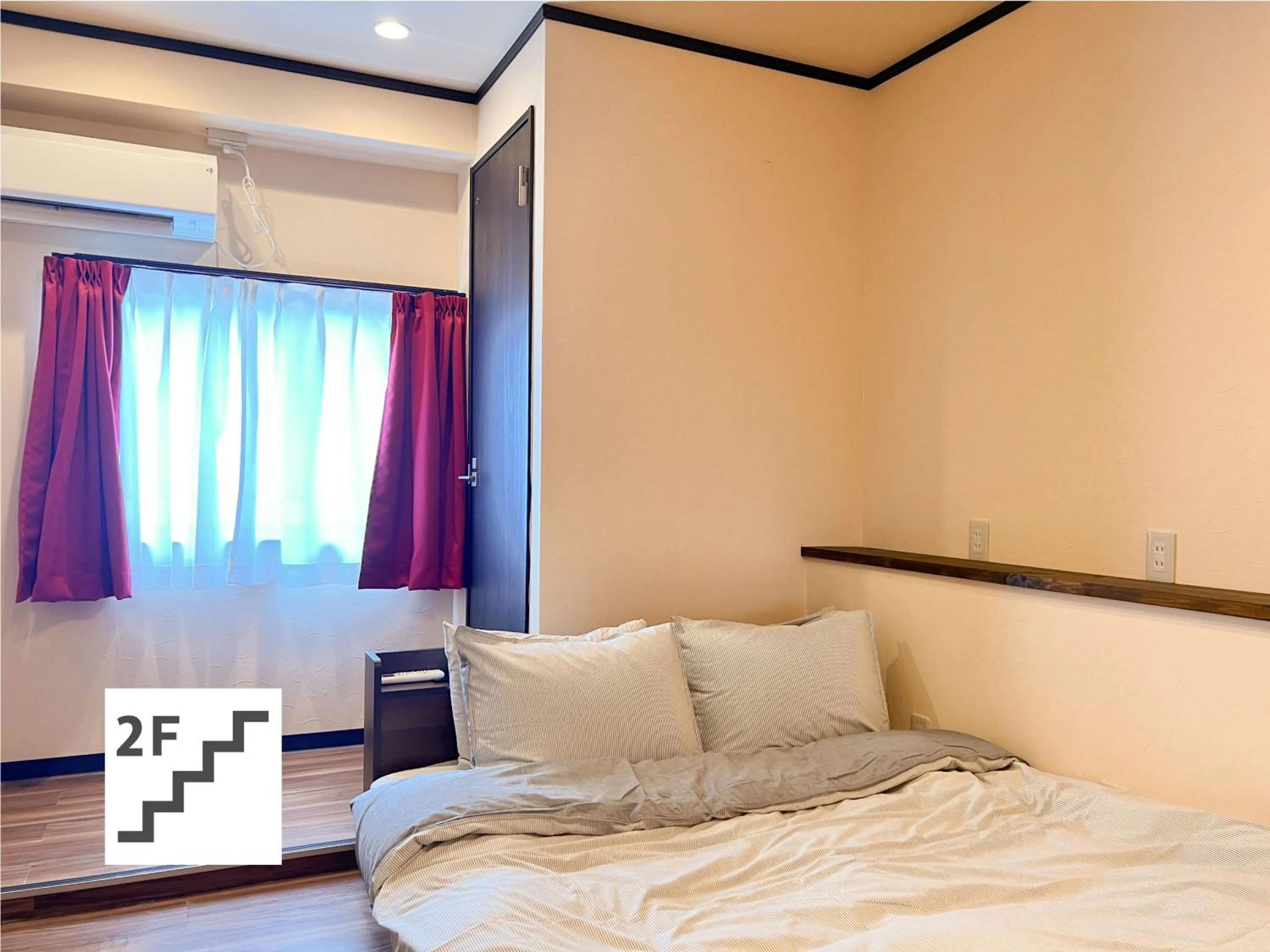 Bed in Jinya Sunset Inn by Murasaki