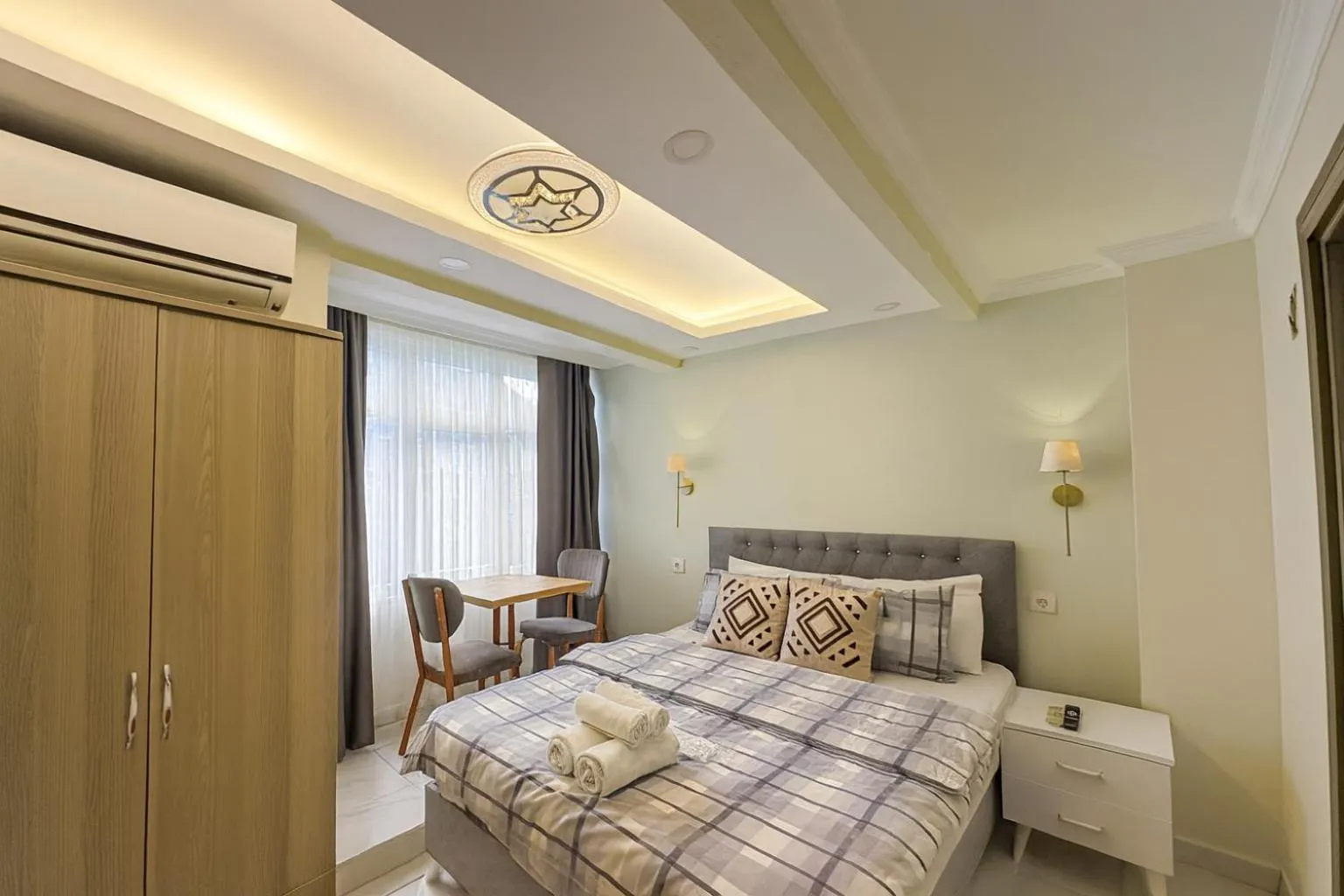 Bed in Ozer Hotel & Apartments