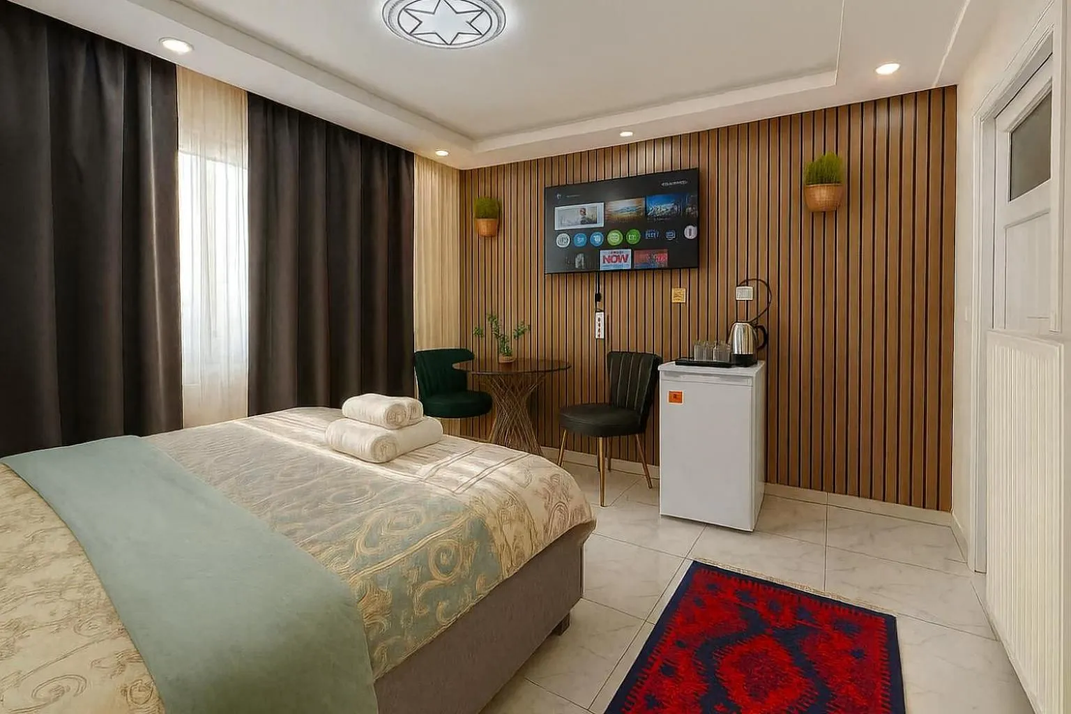 TV and multimedia, Bed in Ozer Hotel & Apartments
