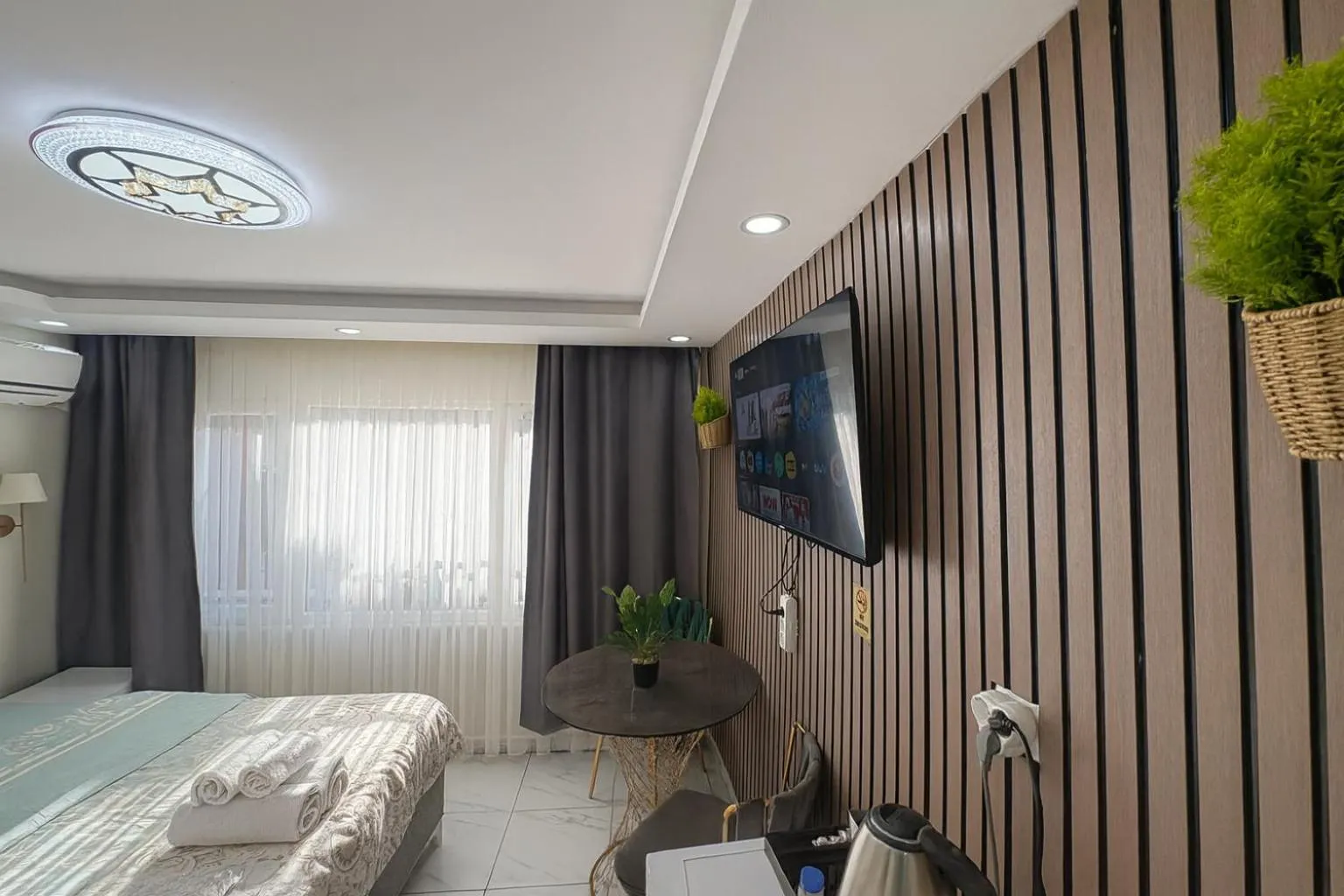 TV and multimedia, Bed in Ozer Hotel & Apartments