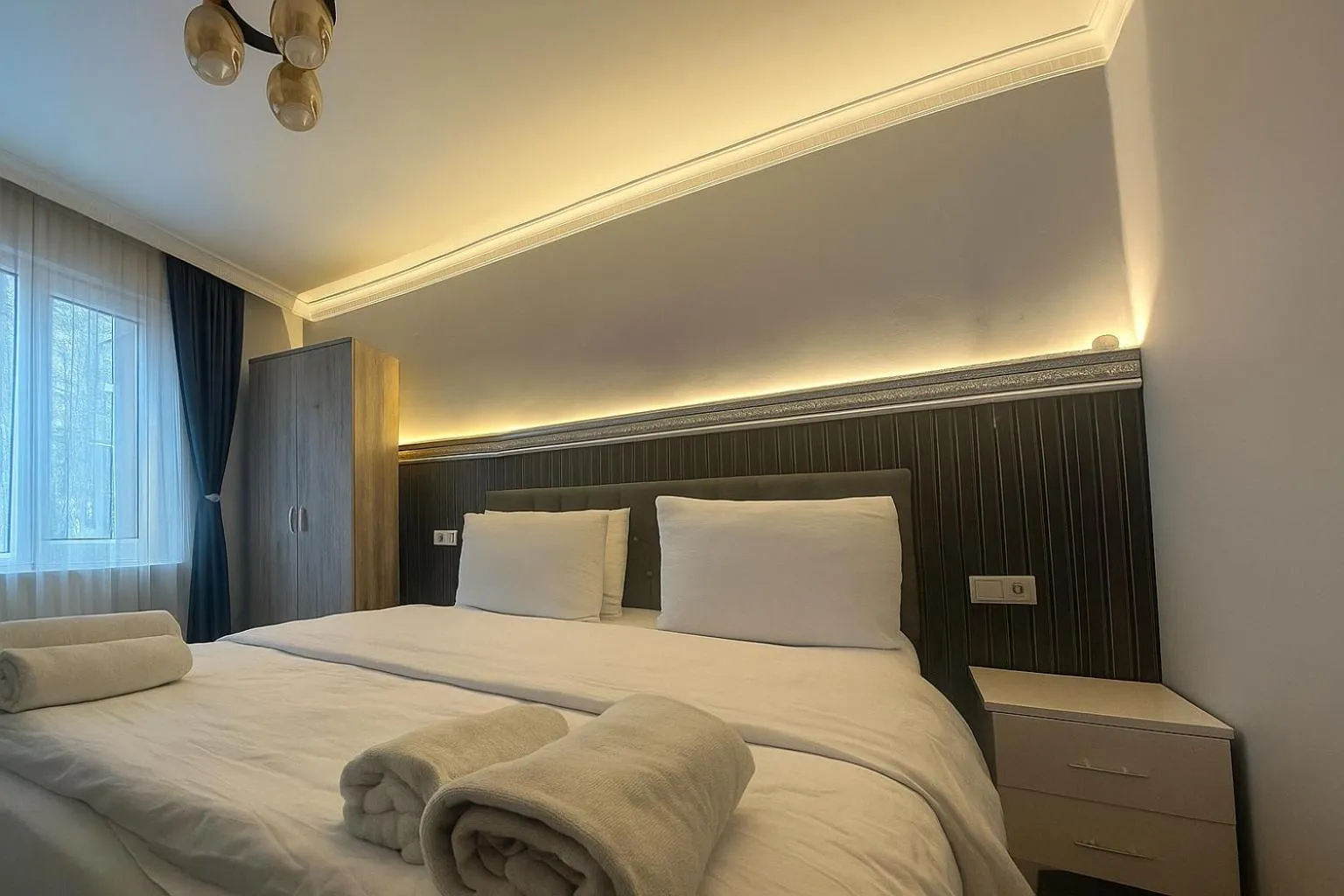Bed in Ozer Hotel & Apartments