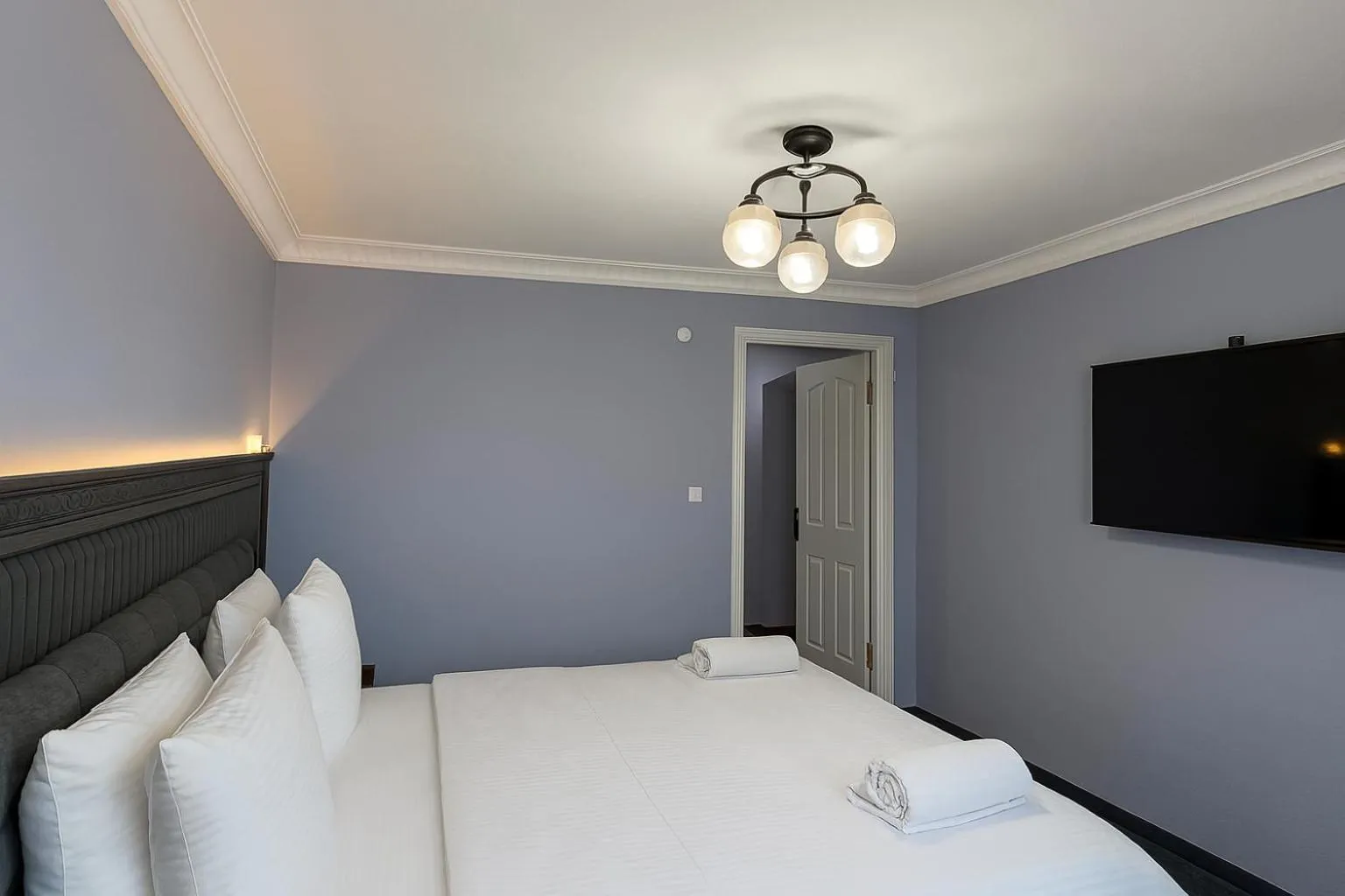 Bed in Ozer Hotel & Apartments