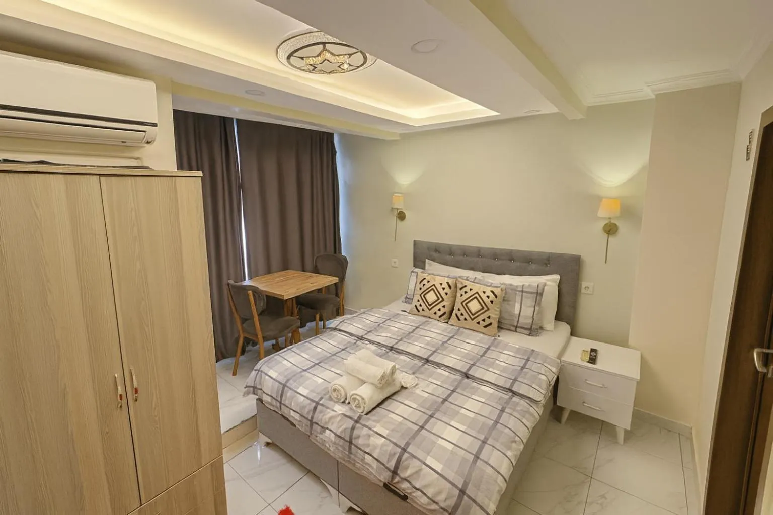 Bed in Ozer Hotel & Apartments