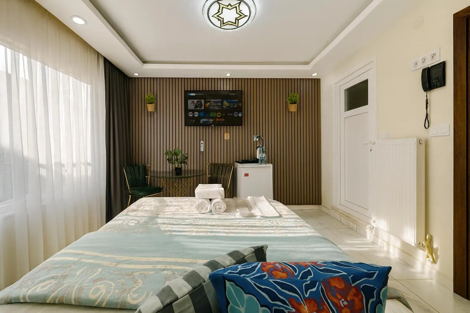 Bed in Ozer Hotel & Apartments
