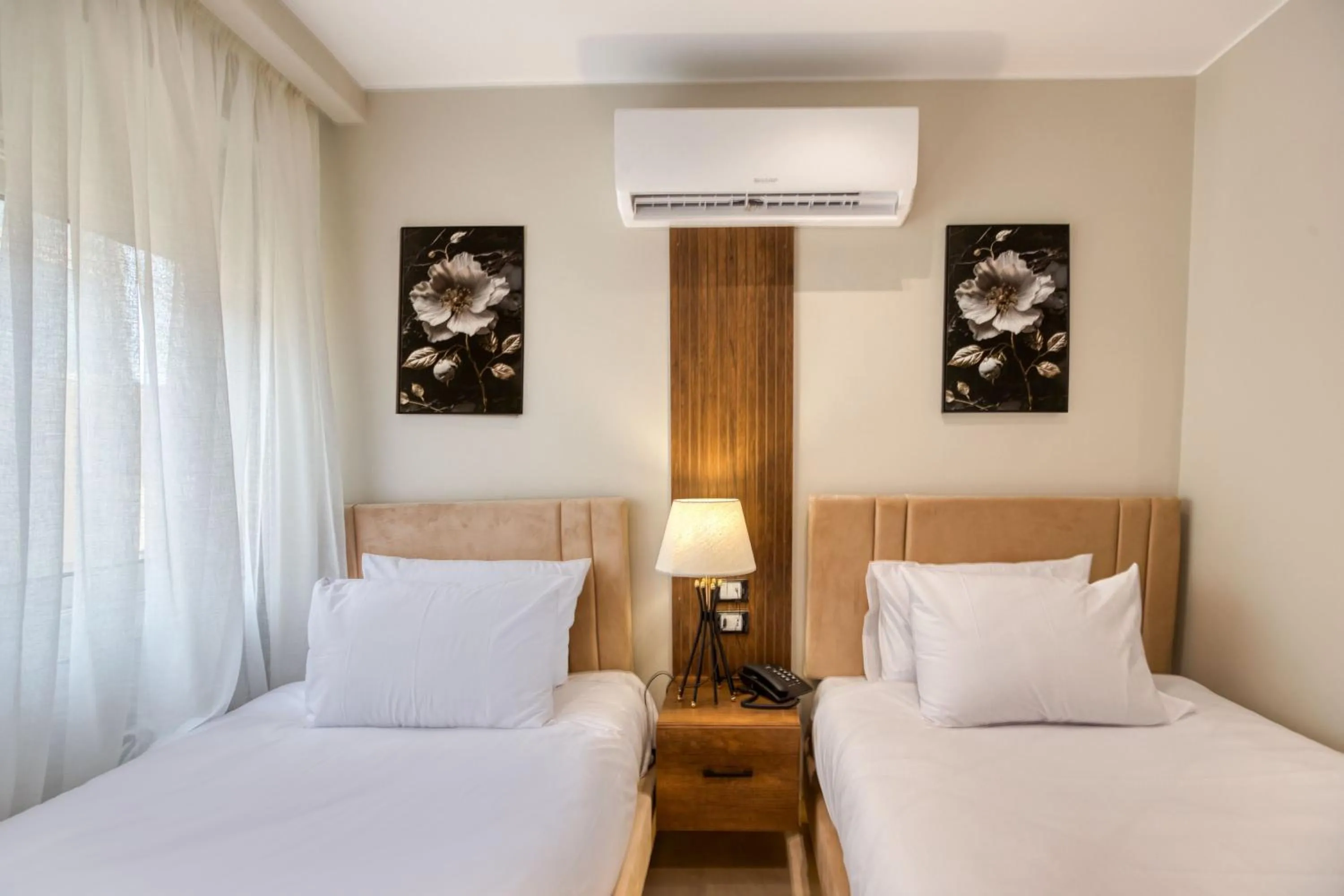 Bed in Gaia Pyramids Hotel