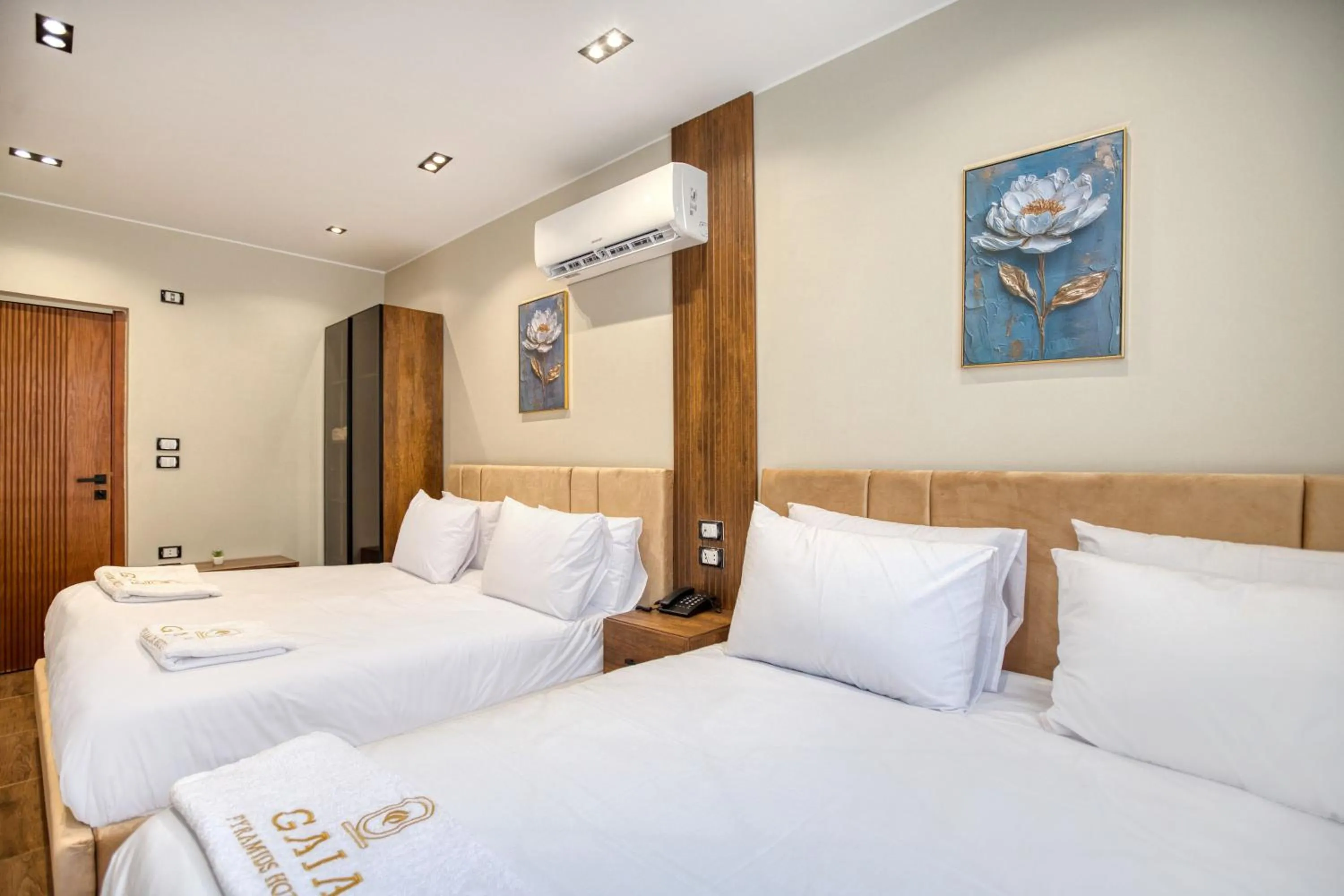 Bed in Gaia Pyramids Hotel