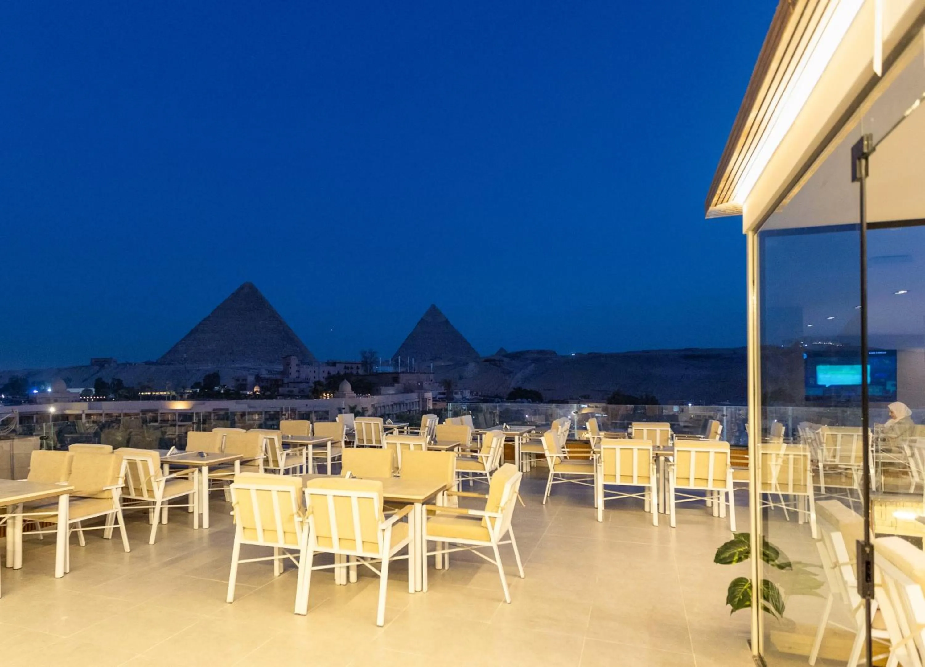 Communal lounge/ TV room in Gaia Pyramids Hotel