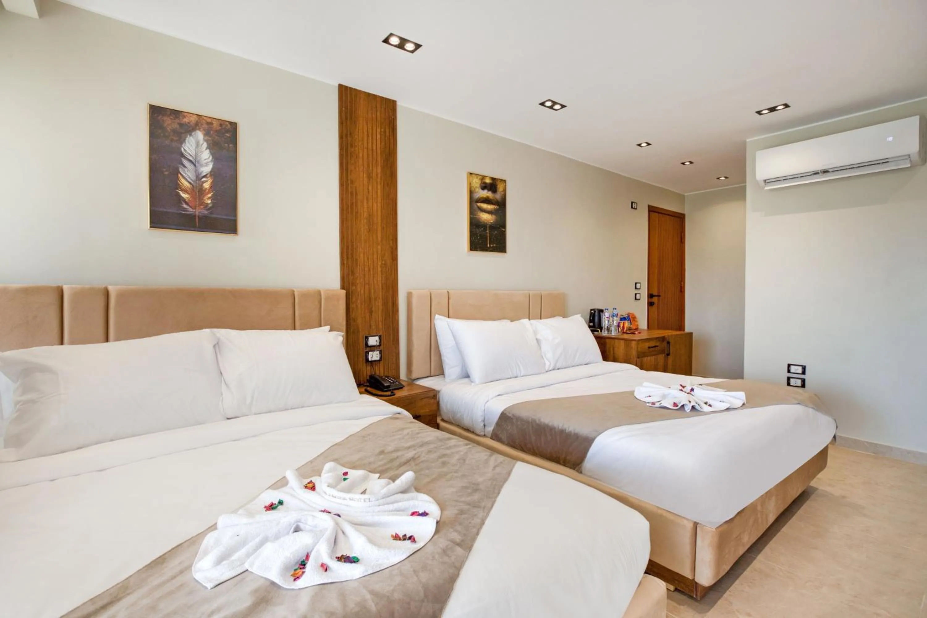 Bed in Gaia Pyramids Hotel