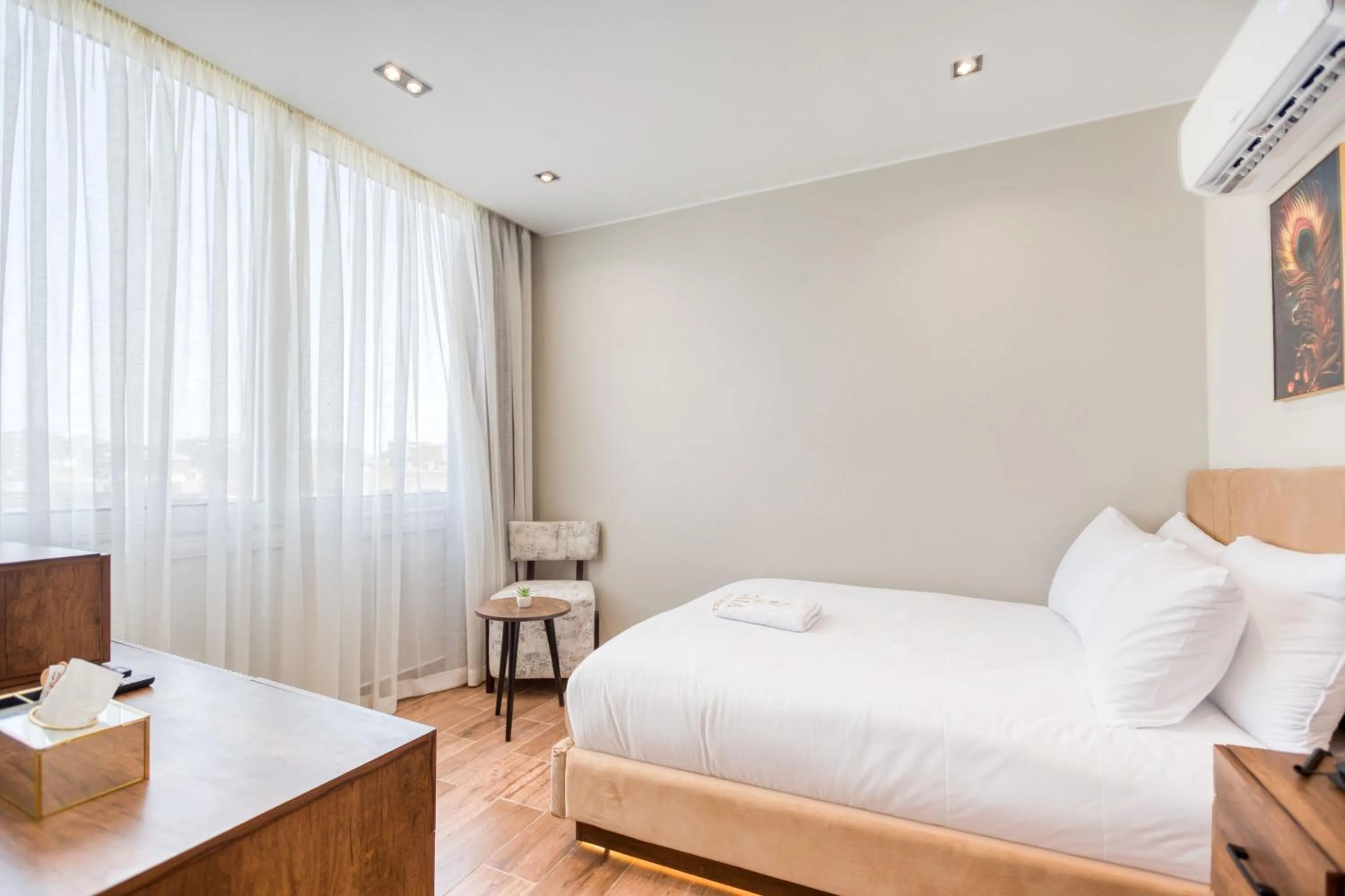Bed in Gaia Pyramids Hotel