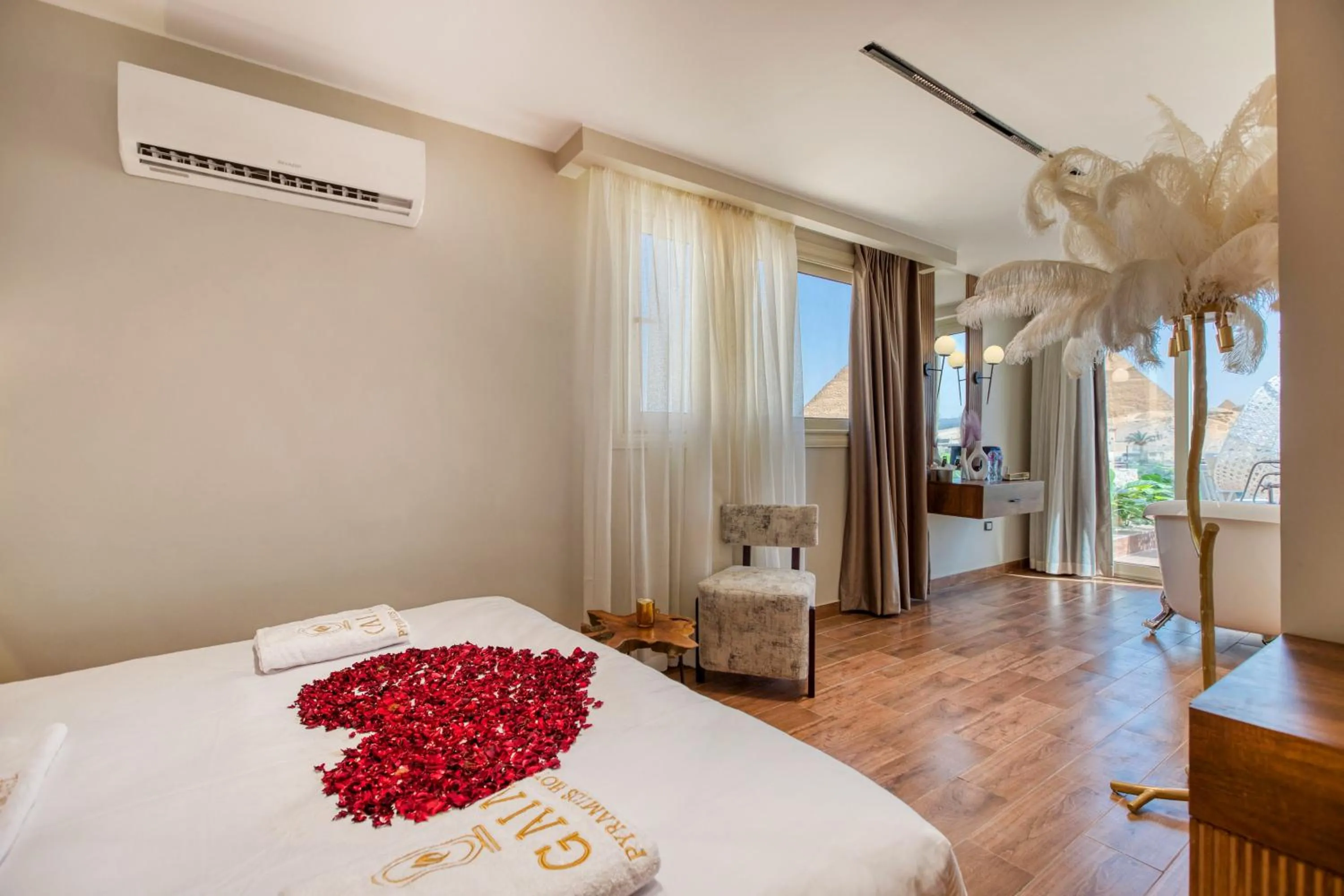 Bed in Gaia Pyramids Hotel