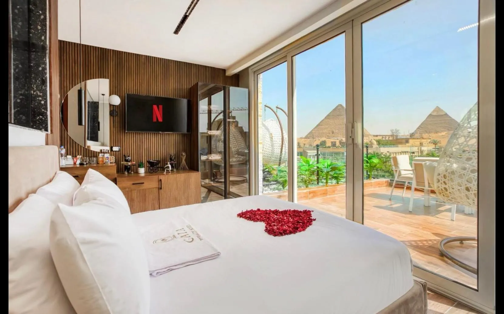 Bed in Gaia Pyramids Hotel