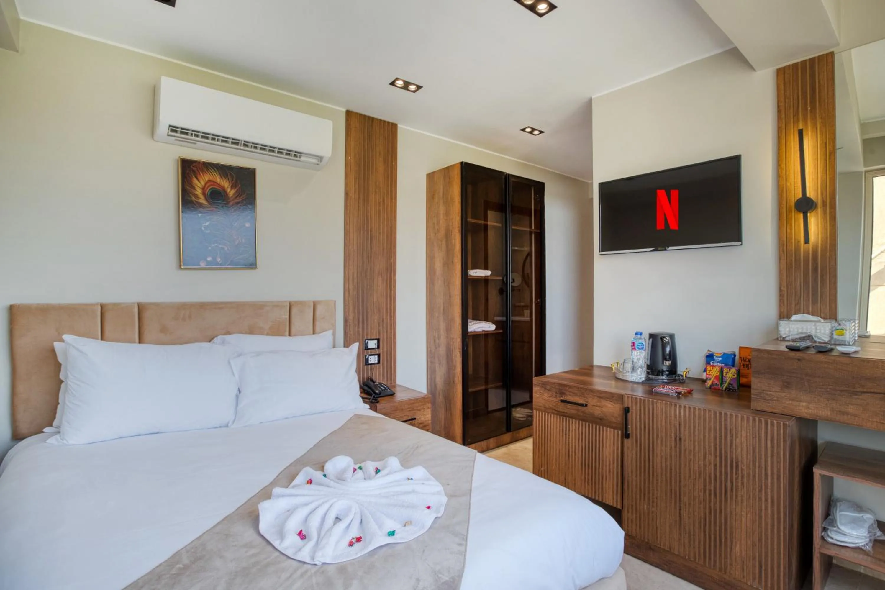 wardrobe, Bed in Gaia Pyramids Hotel
