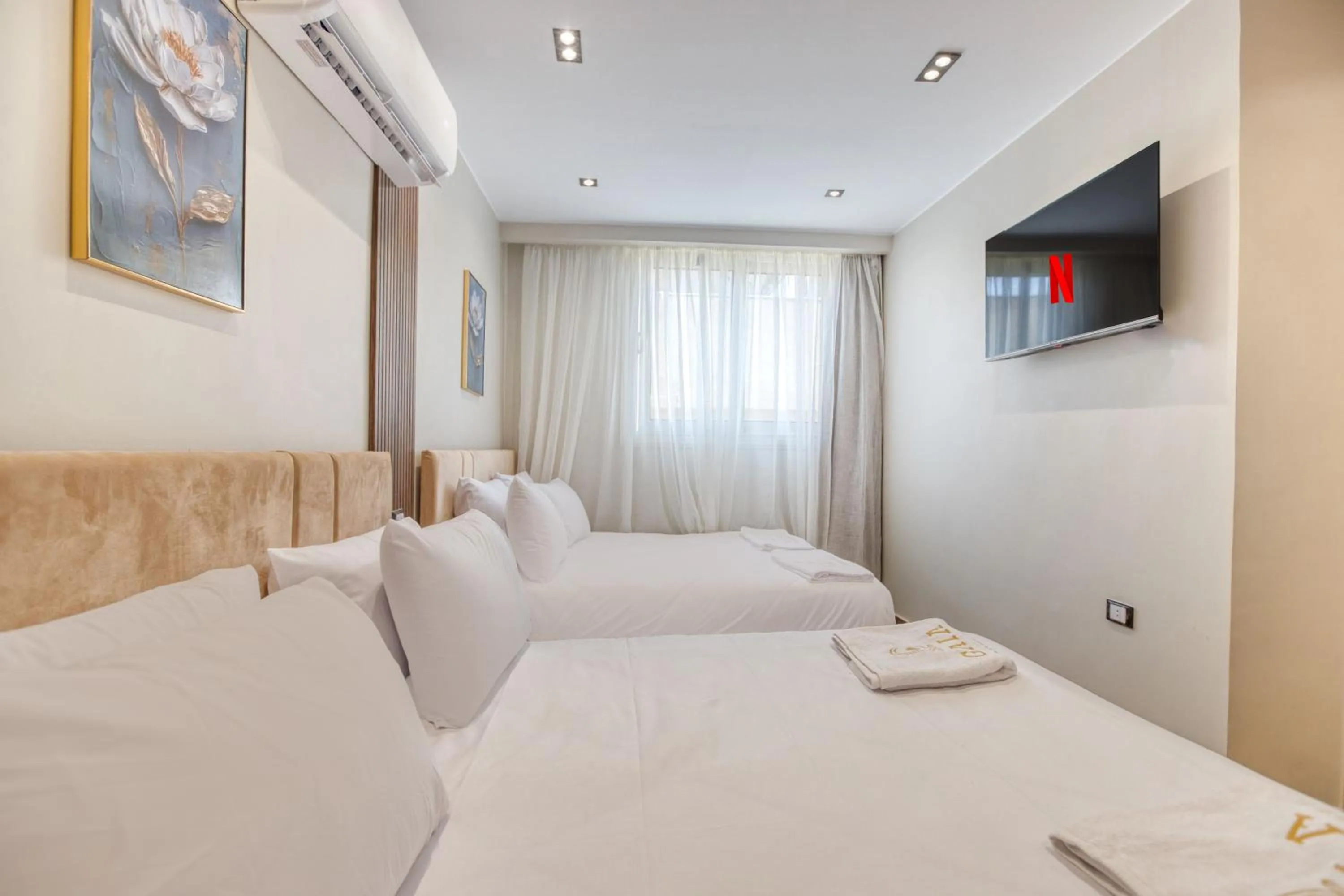 Bed in Gaia Pyramids Hotel