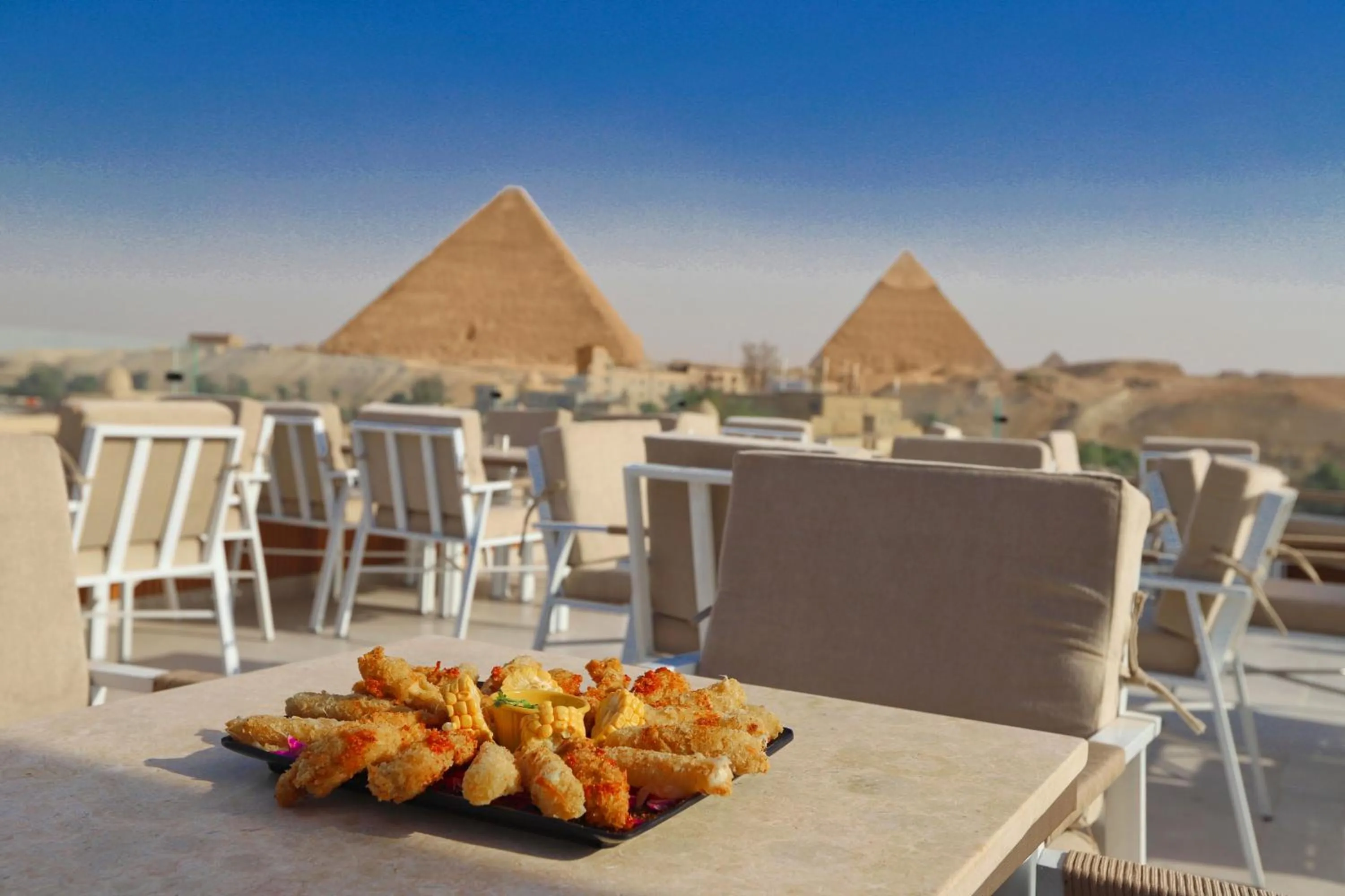 Day in Gaia Pyramids Hotel