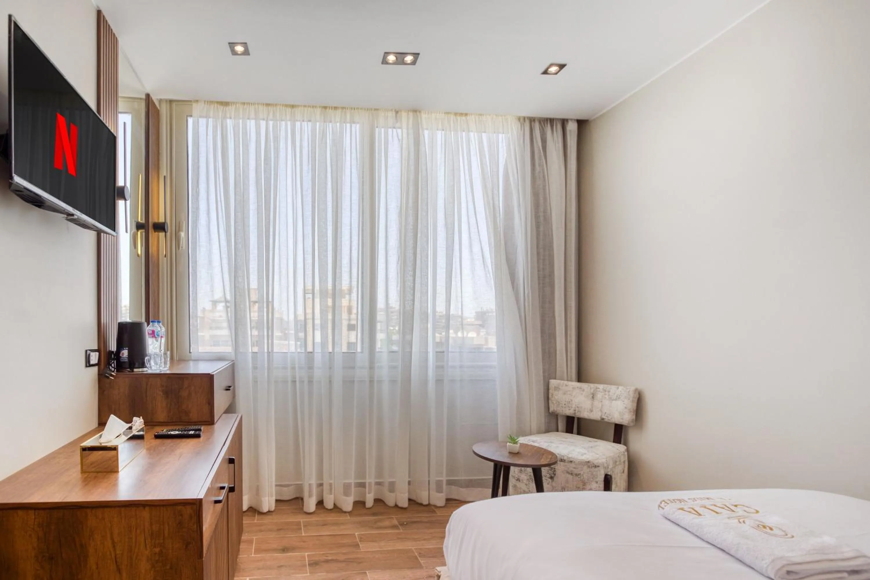 Bed in Gaia Pyramids Hotel