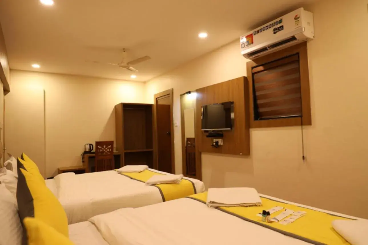 TV and multimedia, Bed in Hotel president park Coimbatore TV and multimedia, Bed in Hotel president park Coimbatore