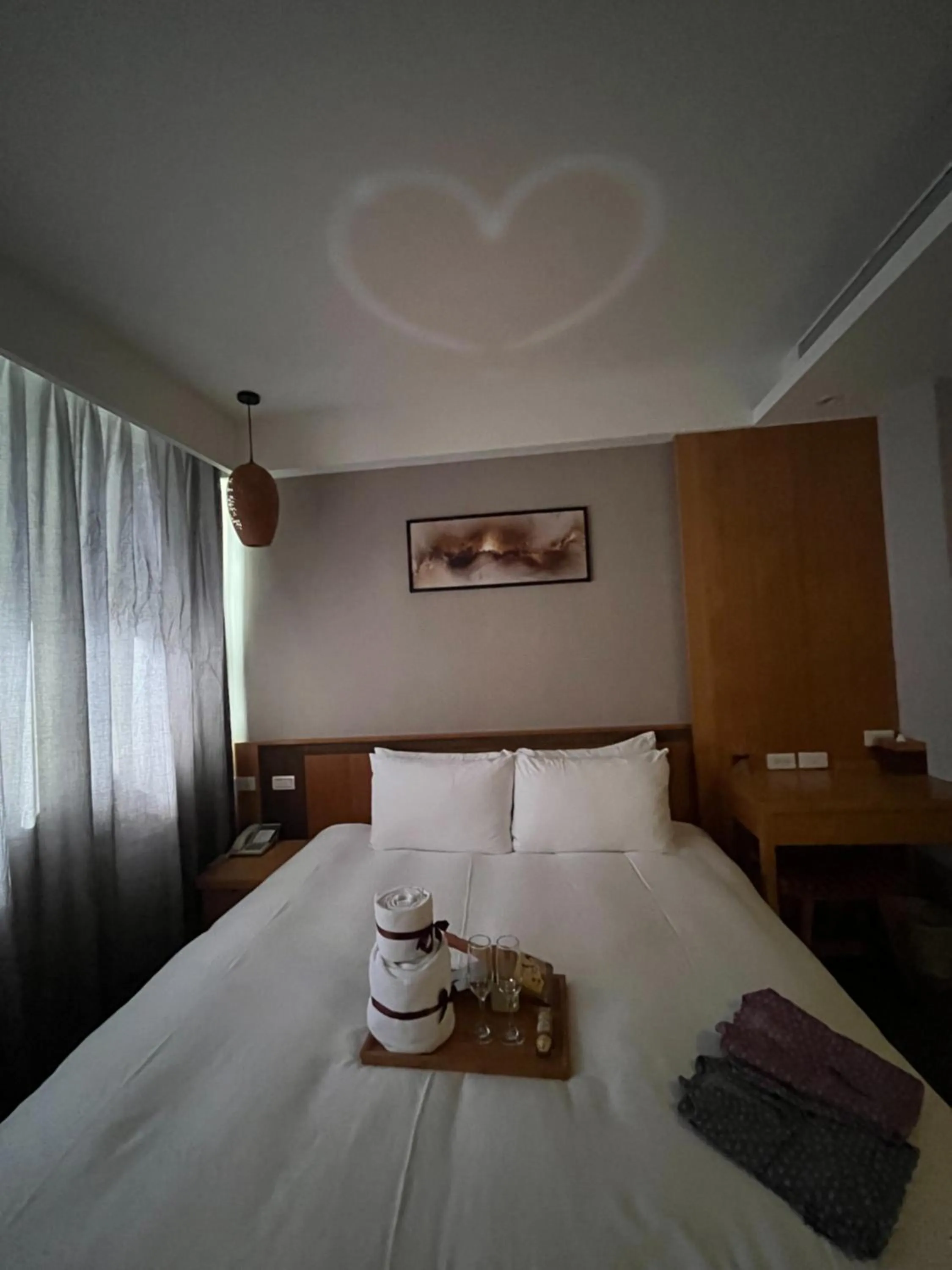 Bed in Tenlien onsen Hot Spring Hotel