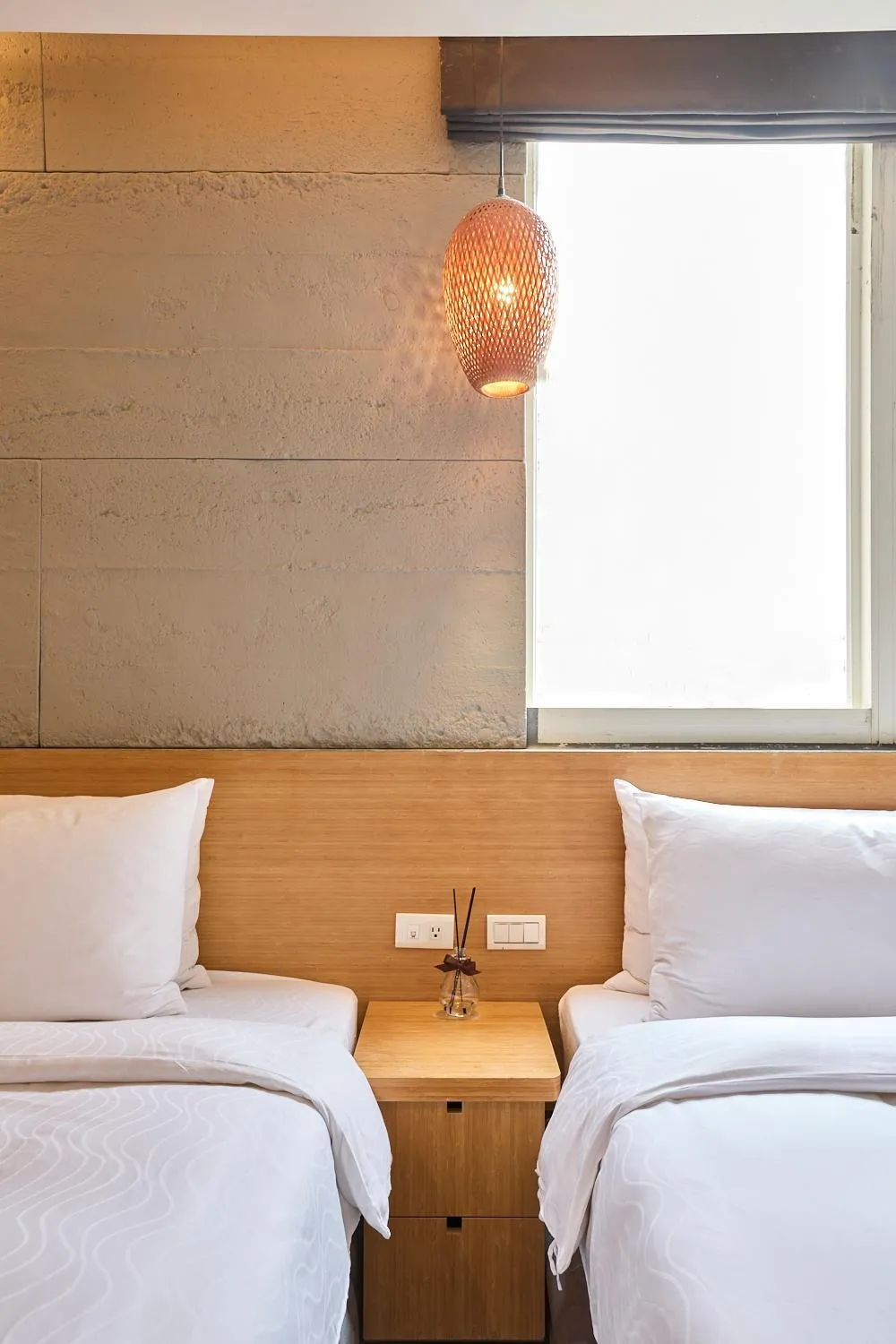 Bed in Tenlien onsen Hot Spring Hotel