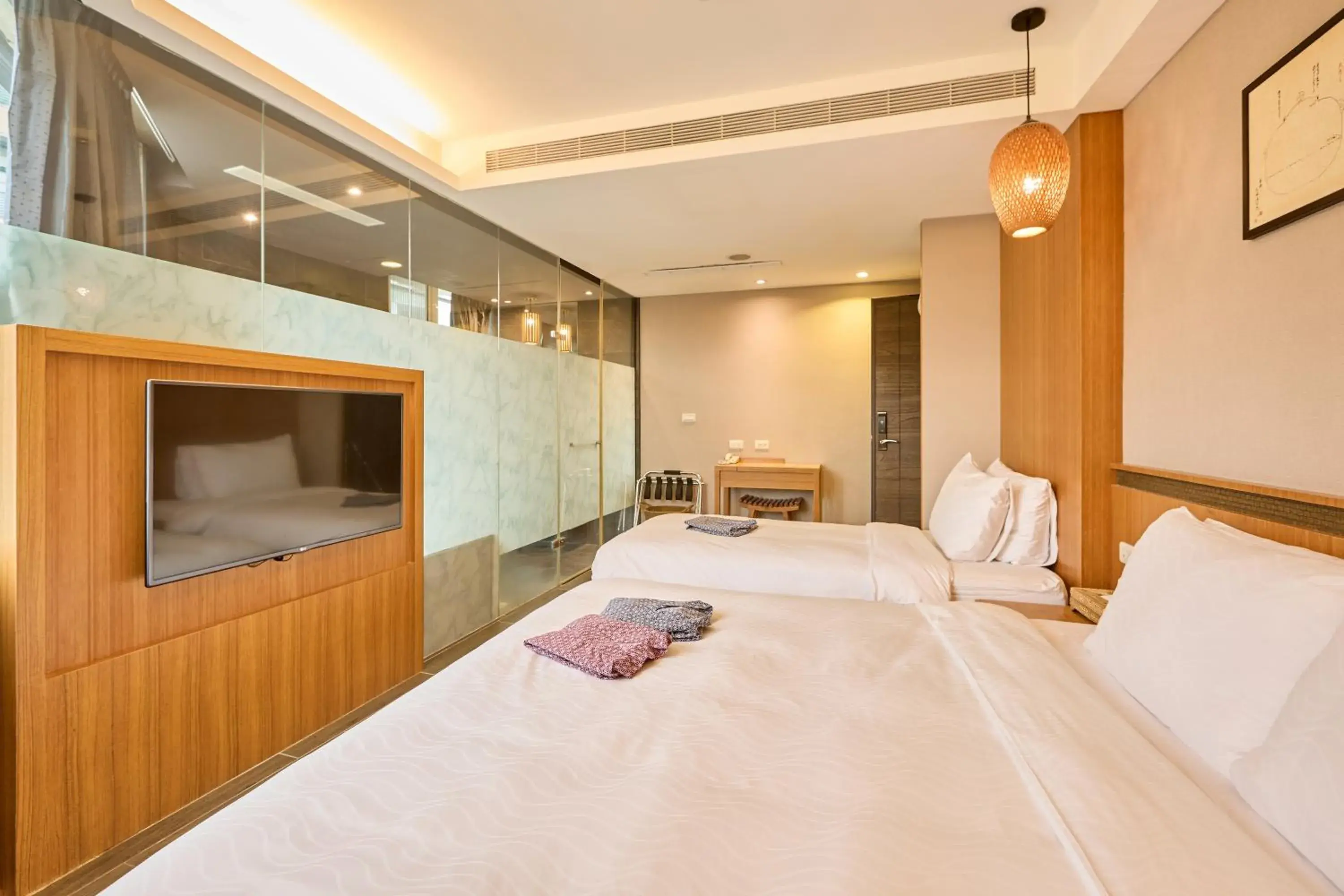 Bed in Tenlien onsen Hot Spring Hotel Bed in Tenlien onsen Hot Spring Hotel