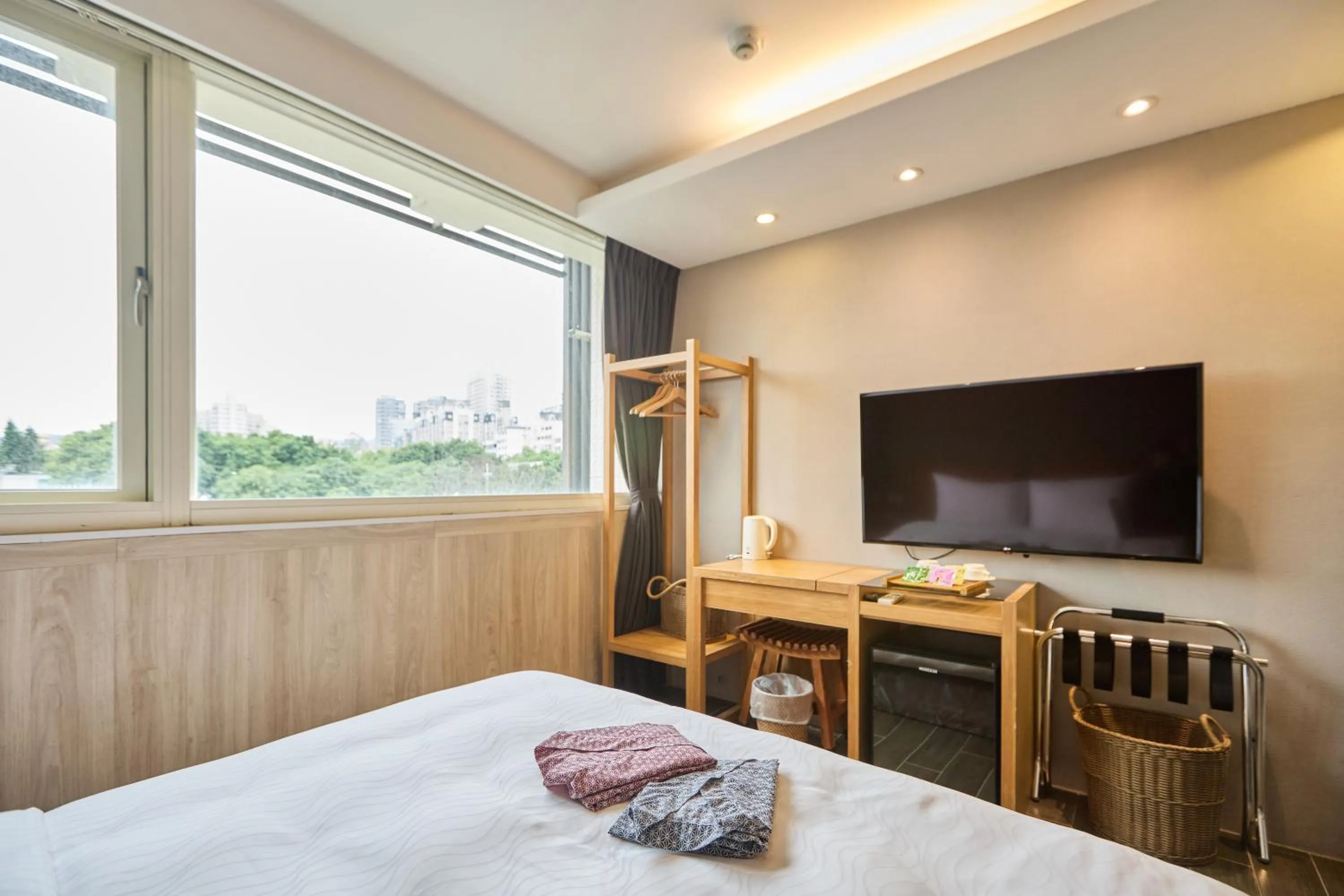 Bed in Tenlien onsen Hot Spring Hotel